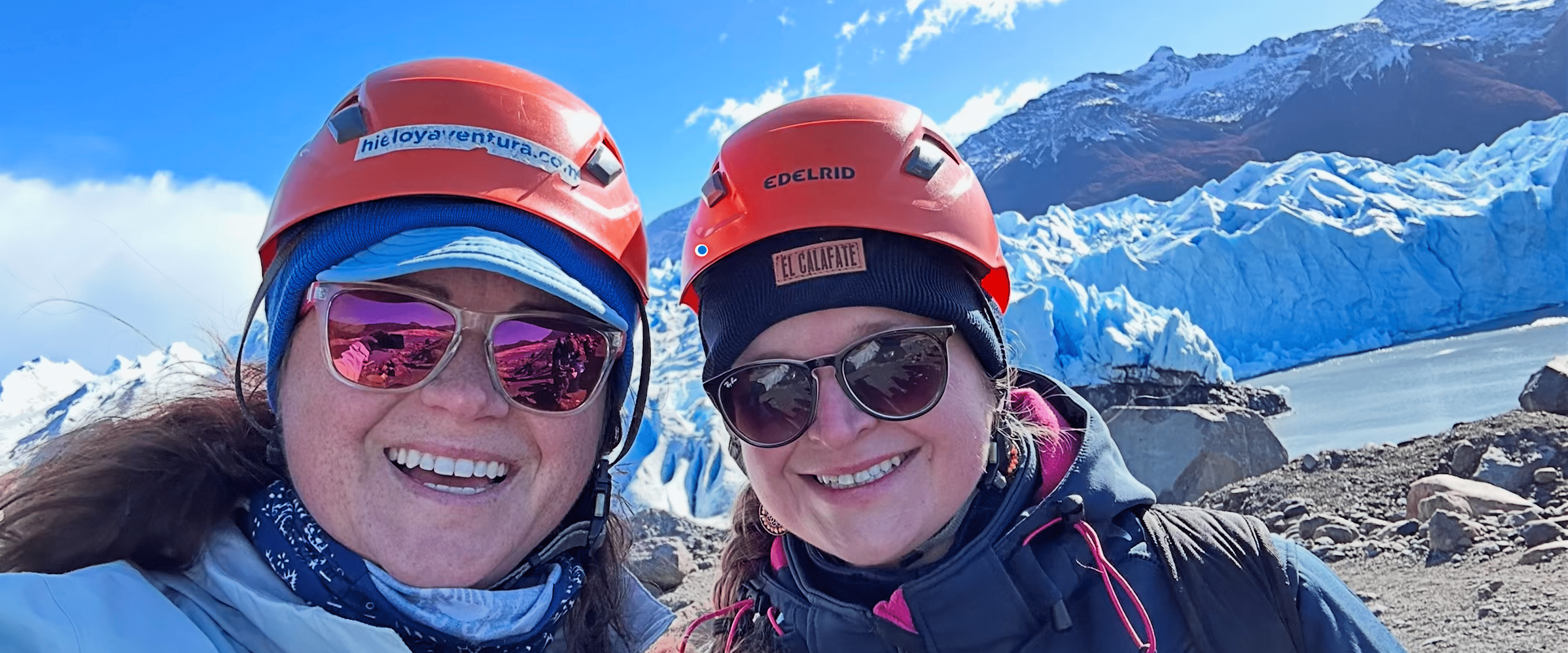 Kate Volzer and a friend in front of a glacier in Argentina.
