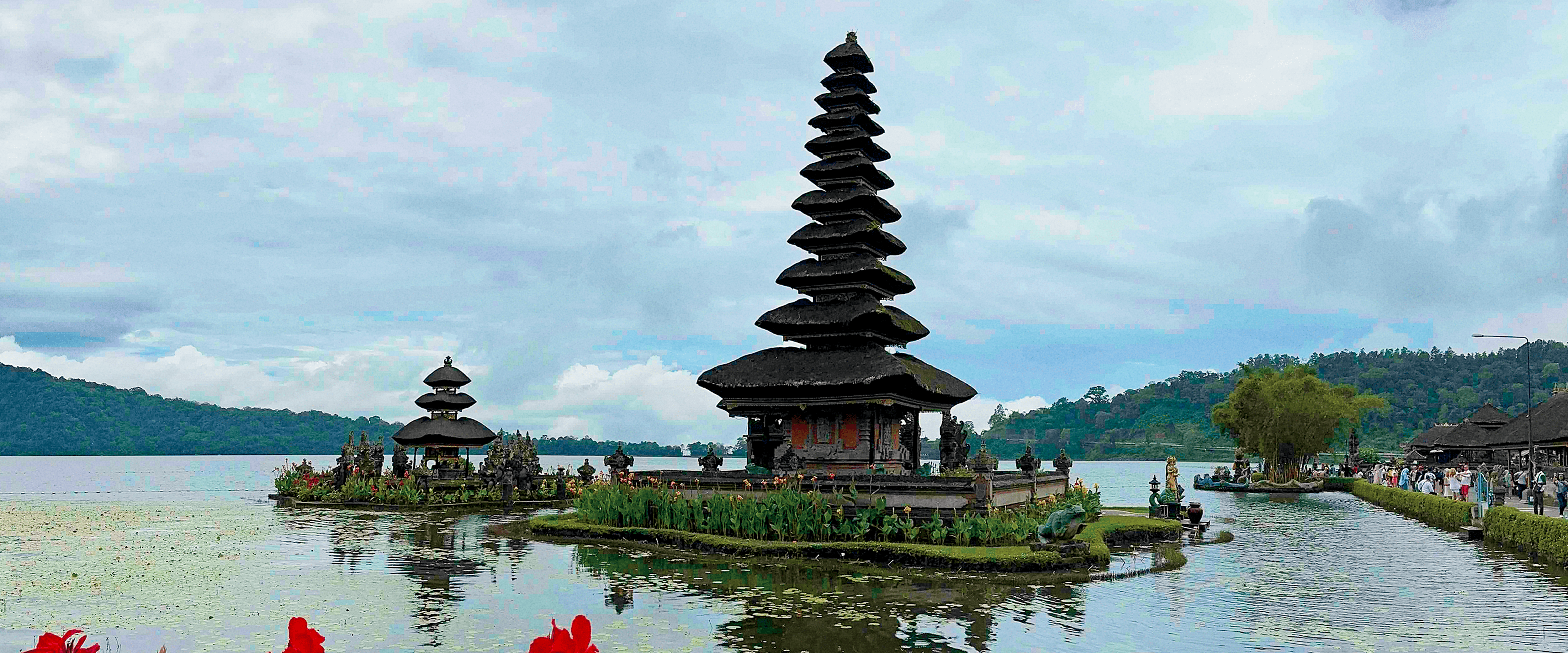 A building with a tall pagoda roof in Bali.
