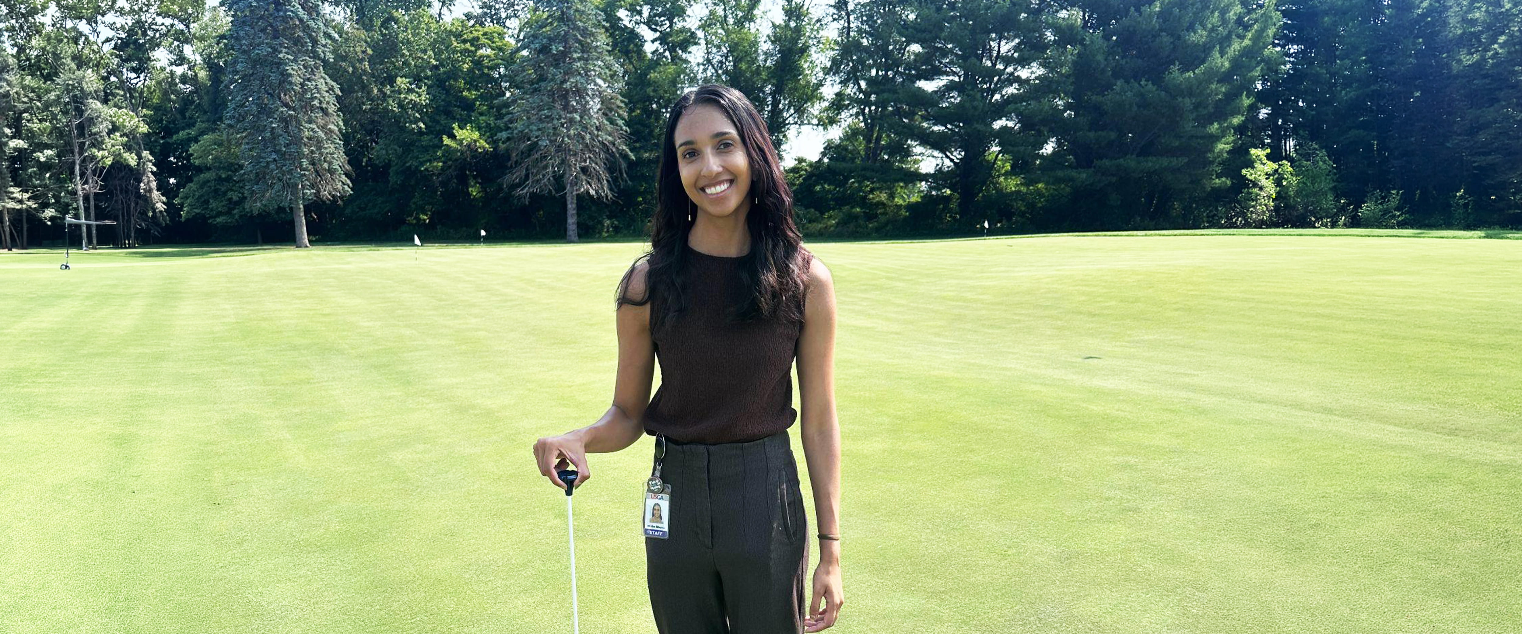 Nisha posing on golf course