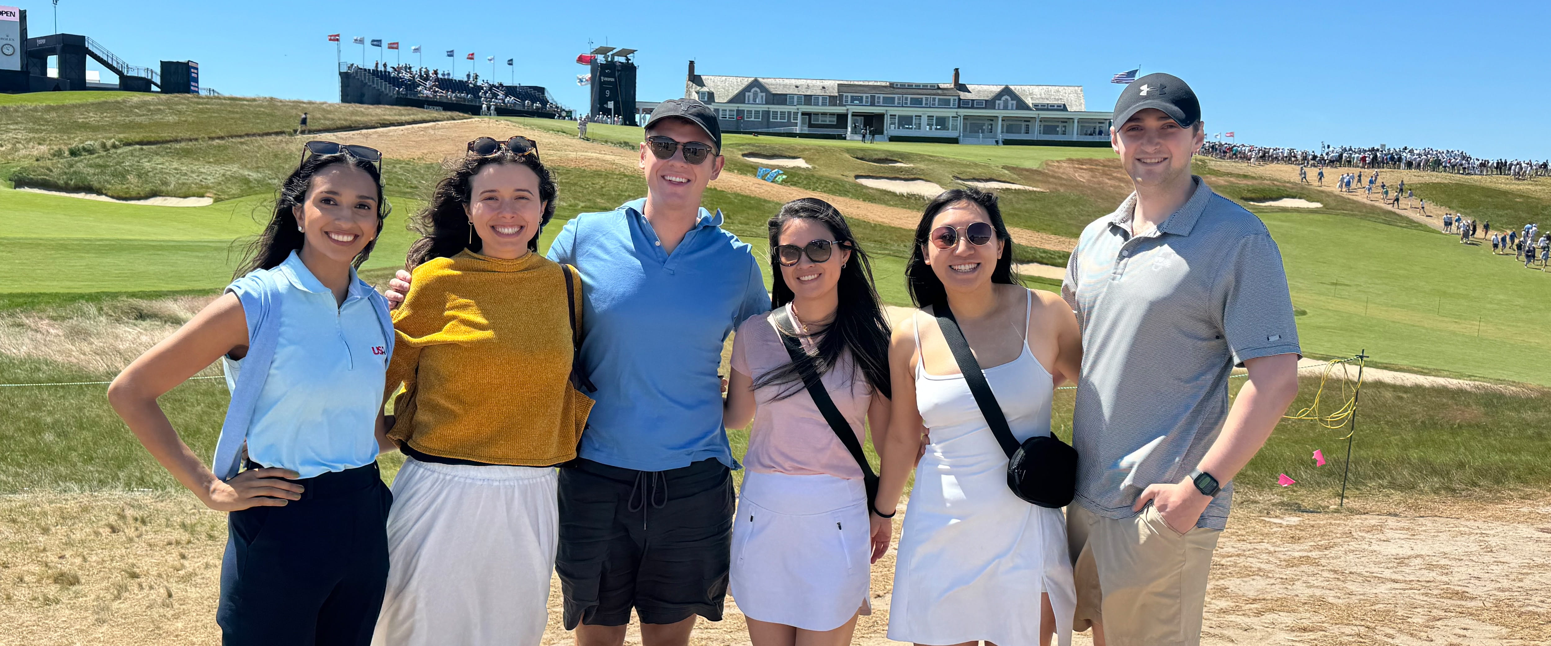 Nisha on the golf course with friends 