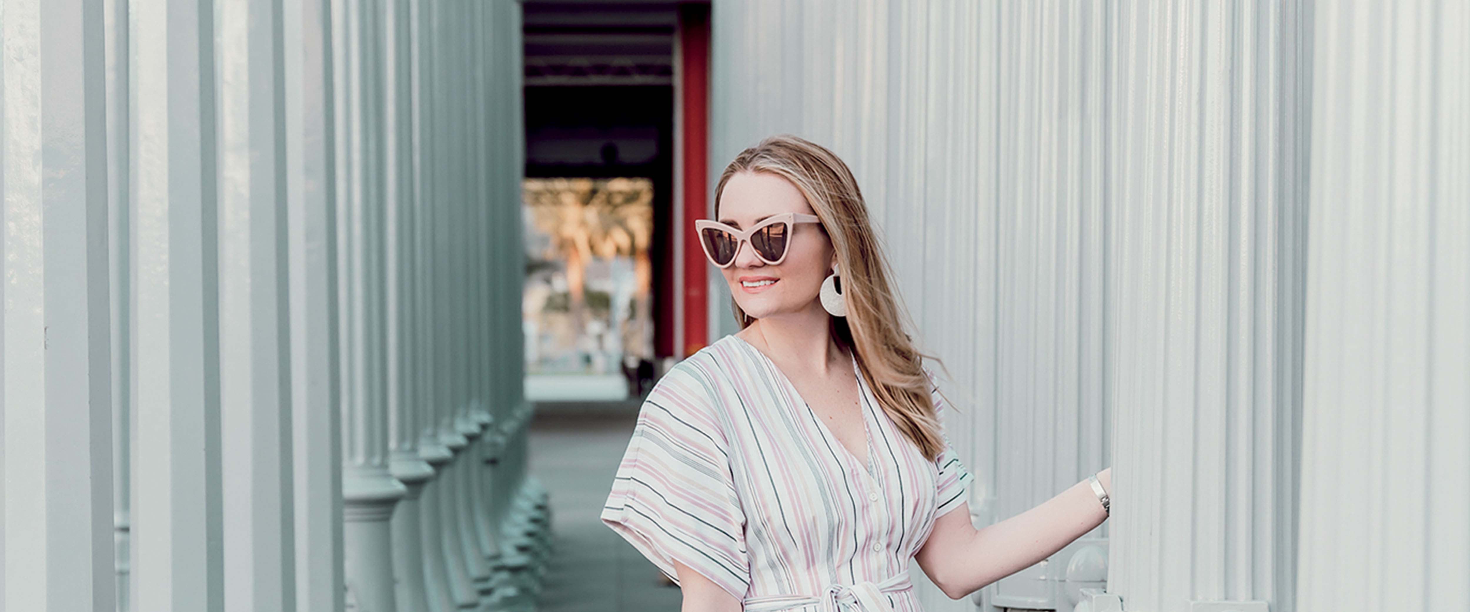 A fashionista wearing high-end clothing and accessories rented from DesignerShare, Meyer and Perkins’s online platform