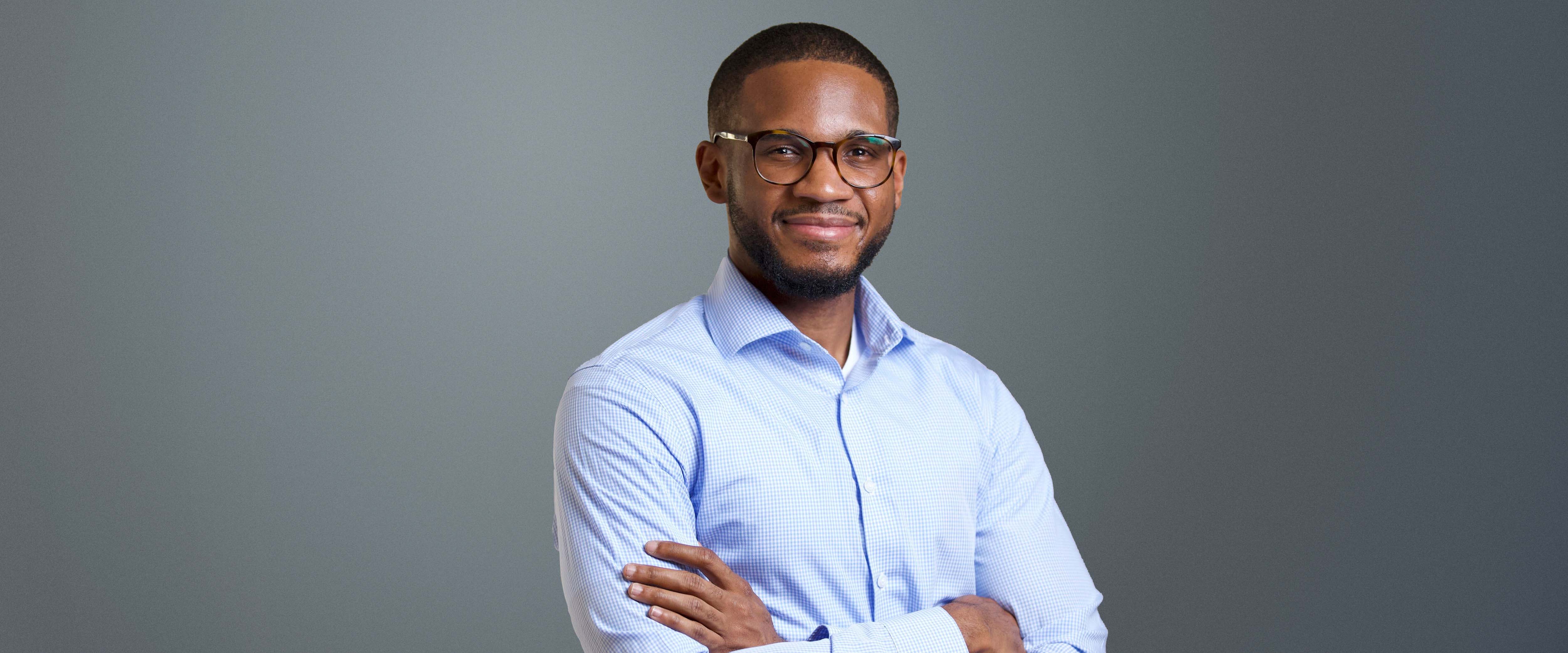 Black and white headshot of Van Jones in front of a gray background