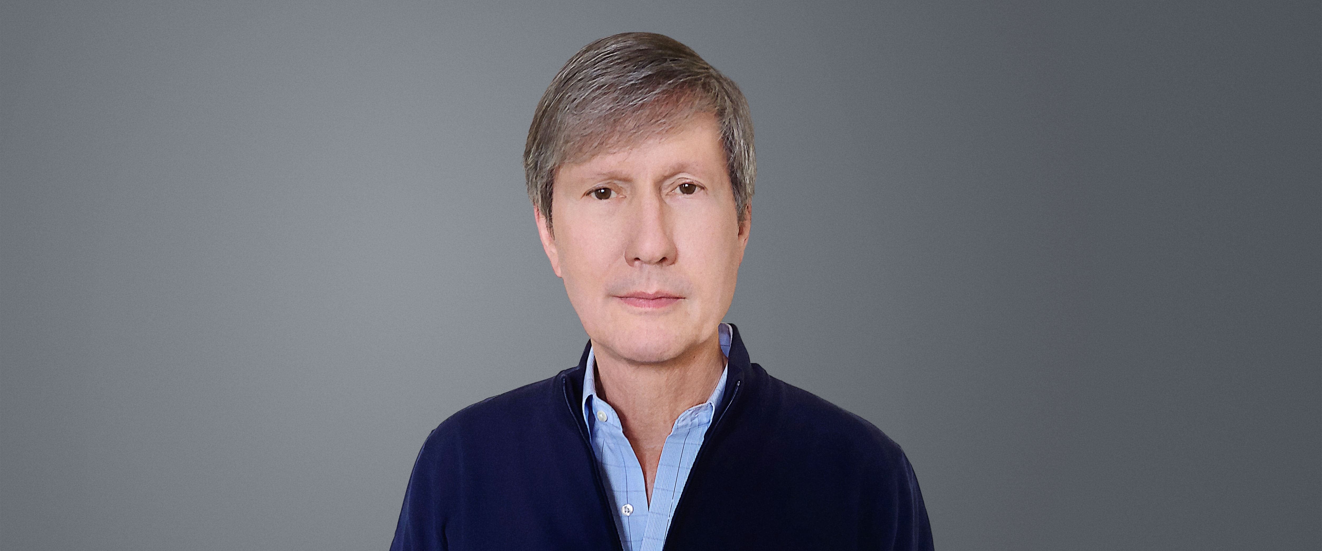 George U. “Gus” Sauter headshot landscape orientation