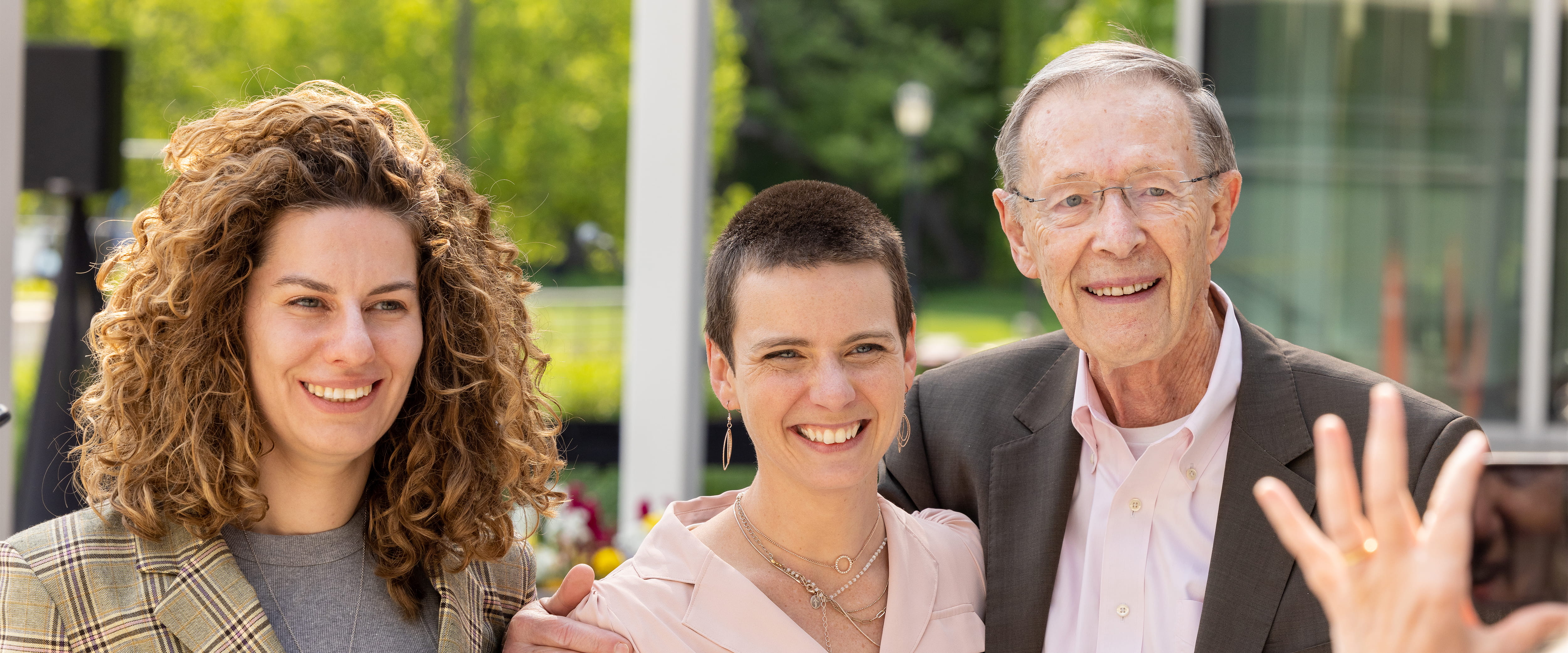 Harry Davis smiling with his colleagues 
