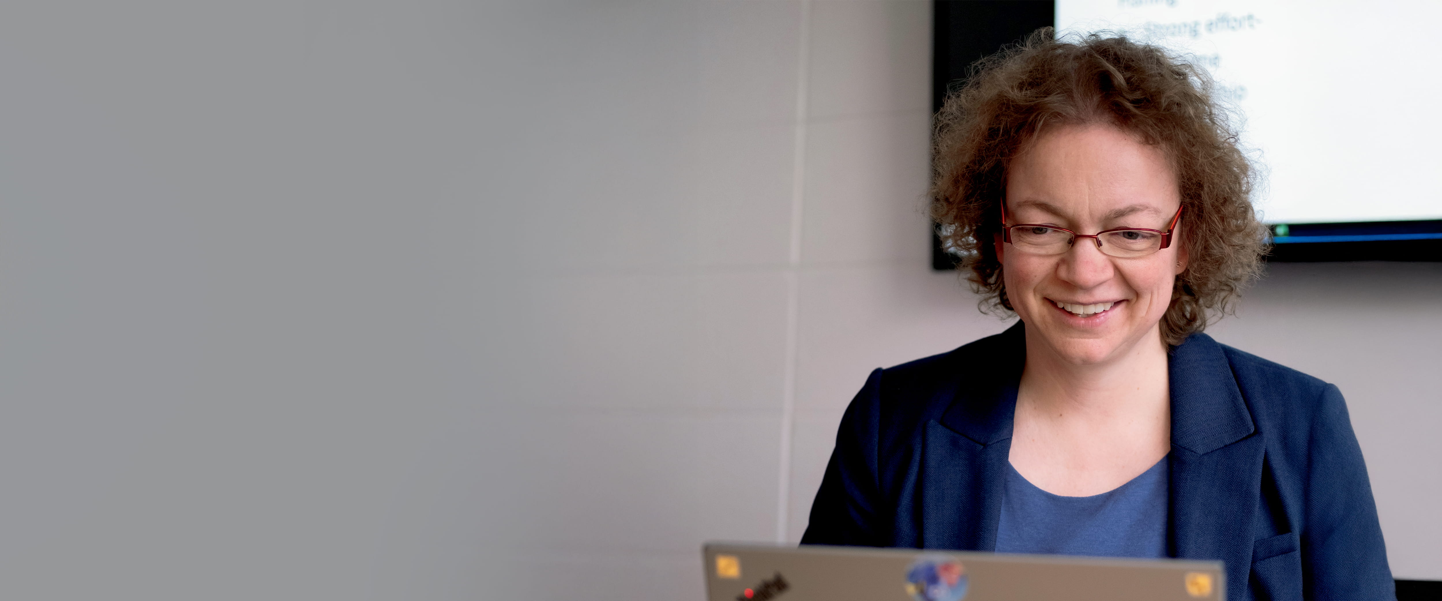 Karen Bernhardt-Walther working on laptop