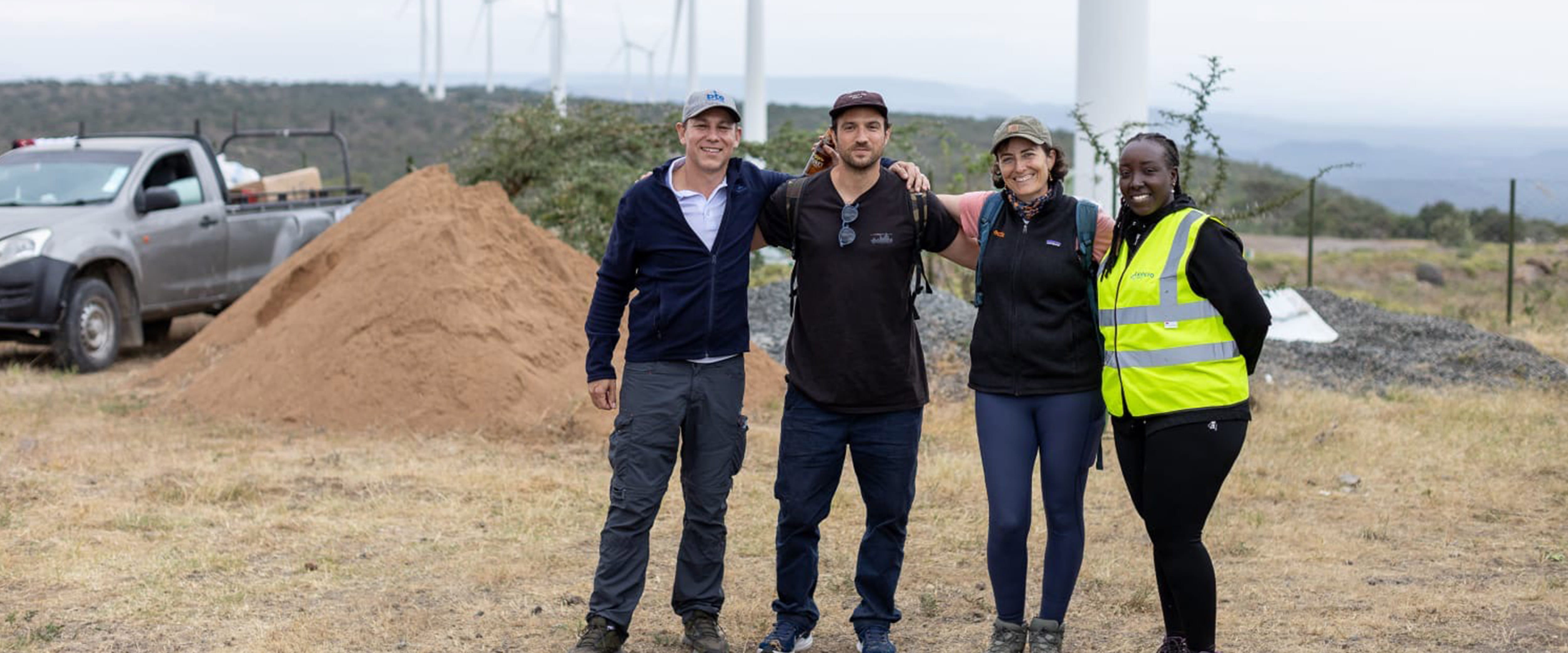 Lisa and group taking group photo in wind site