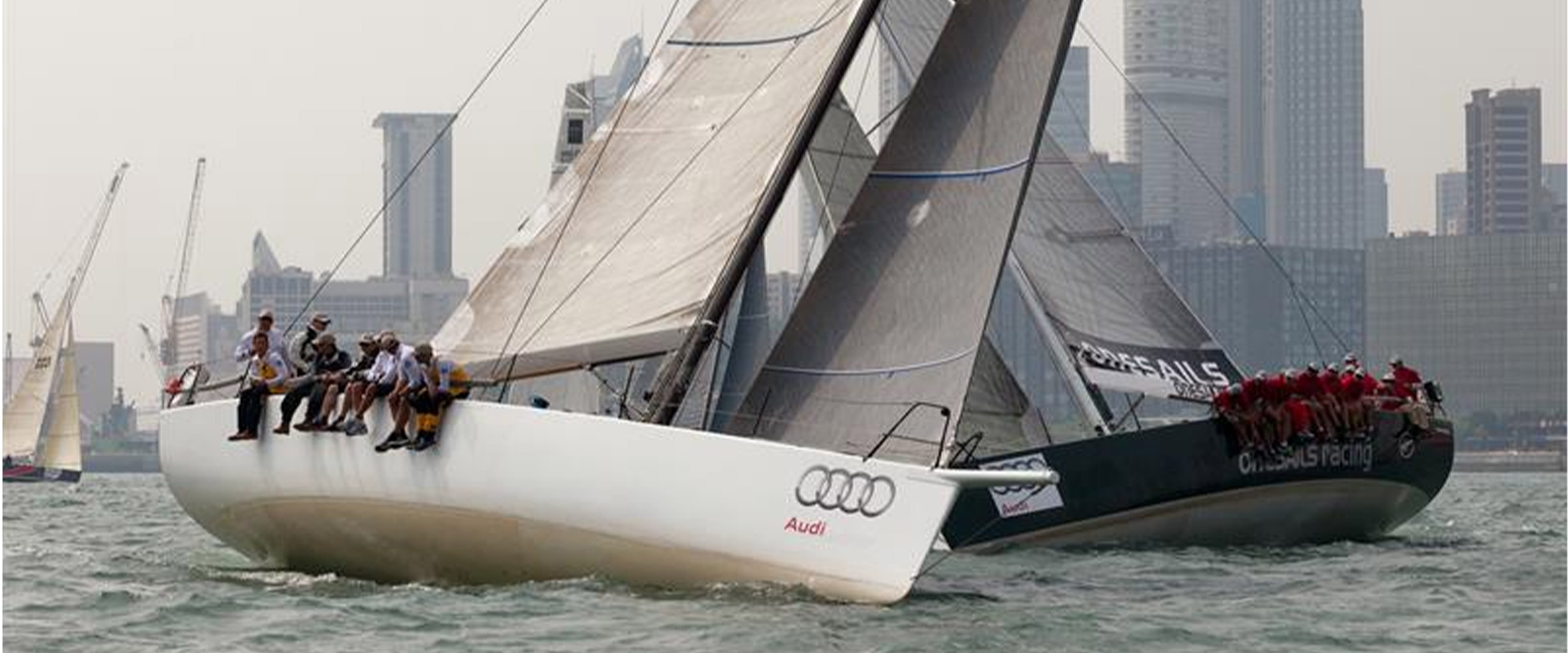 Two sailboats passing by each other.