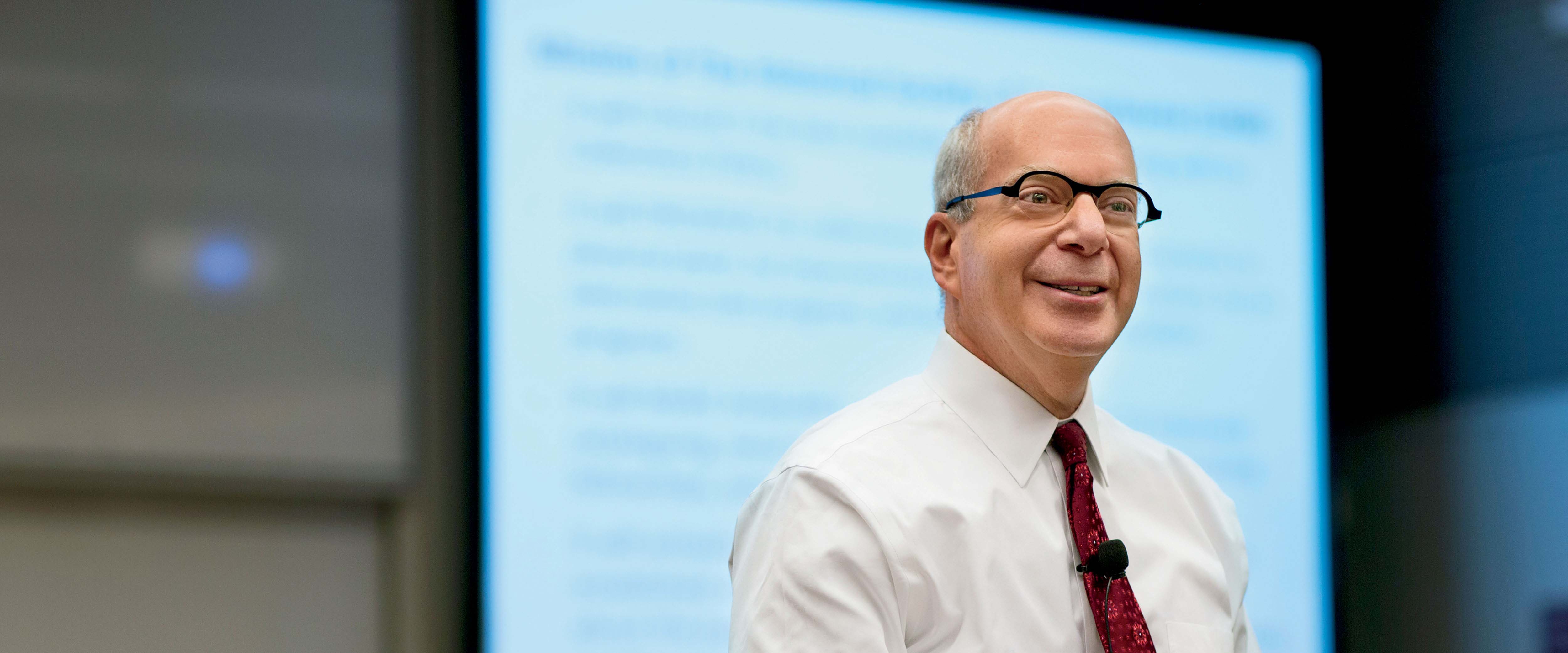 Professor Robert H. Gertner, faculty director of the Rustandy Center, teaching his class