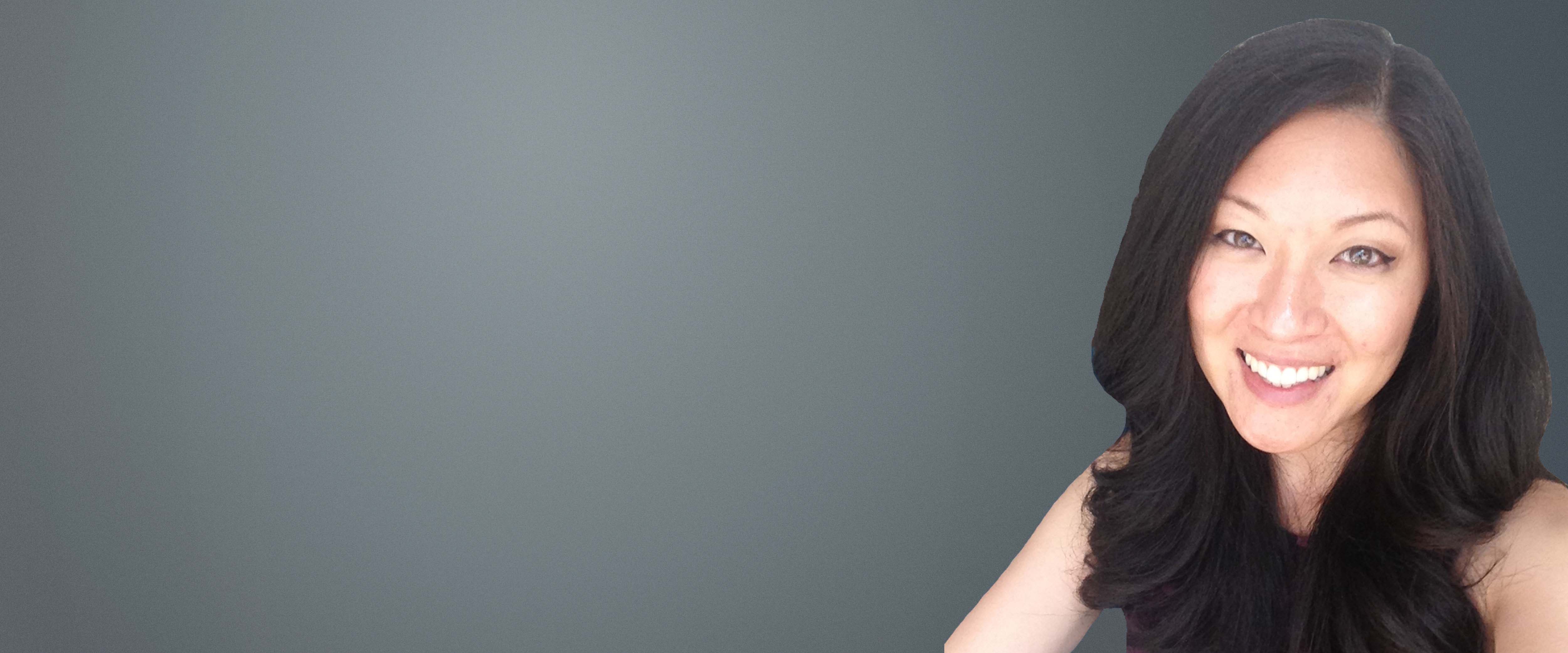 Black and white headshot of Andi Hadisutjipto in front of a gray background