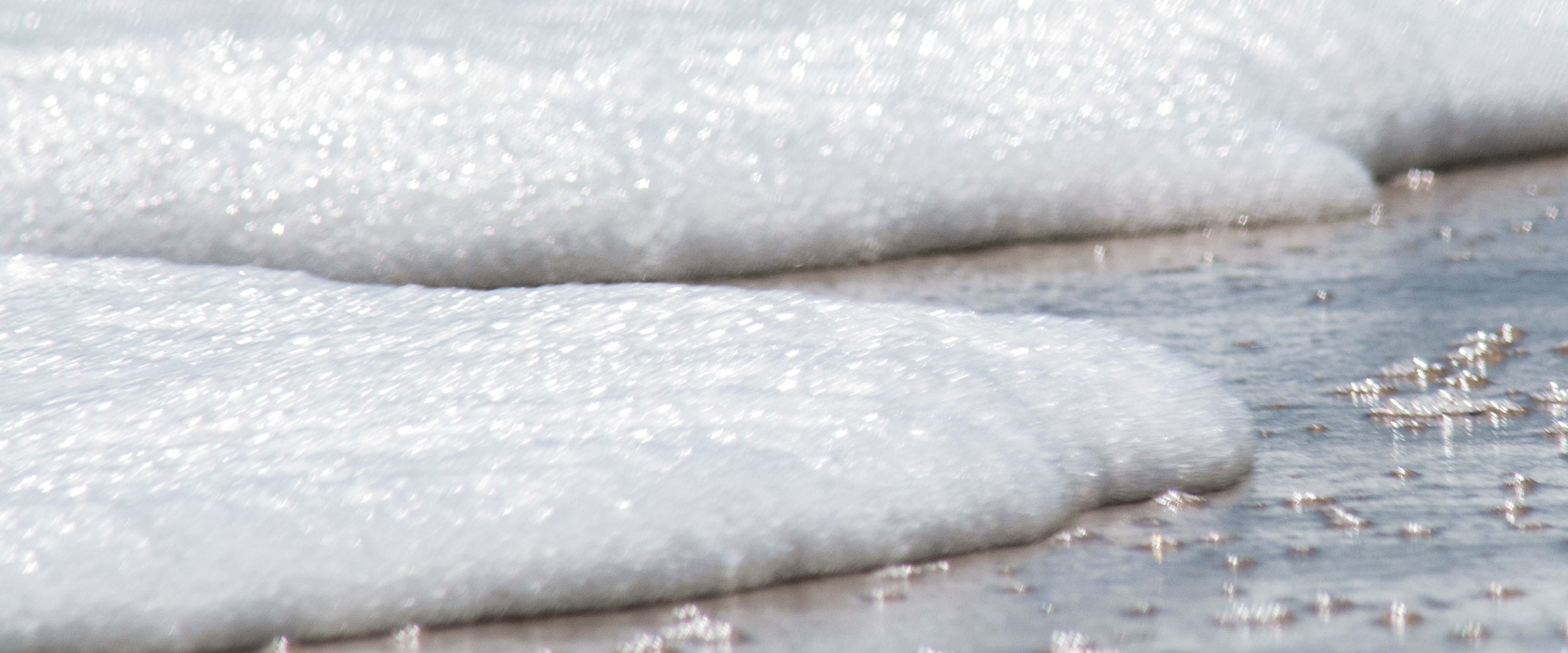 Waves turned to ice on a beach