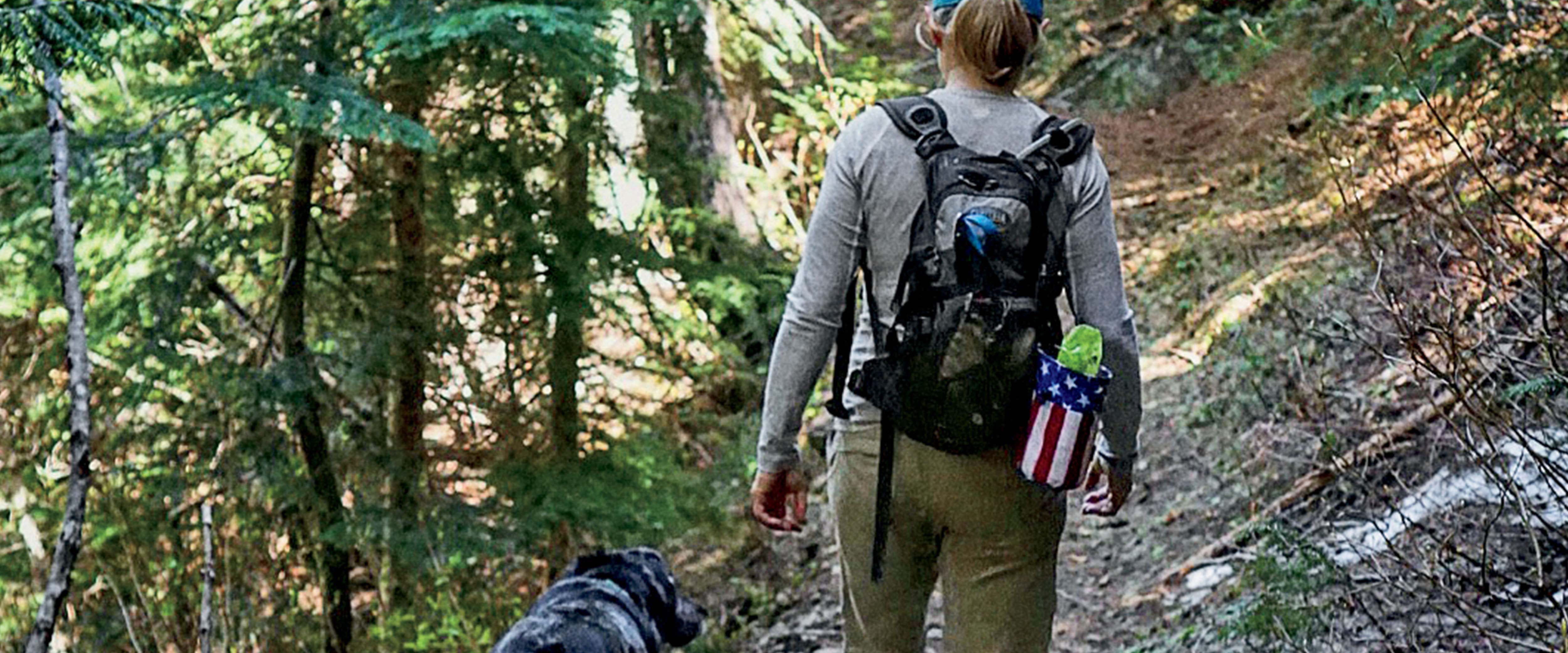 Sue Long on a hike with her Aussiedor, Hazel.