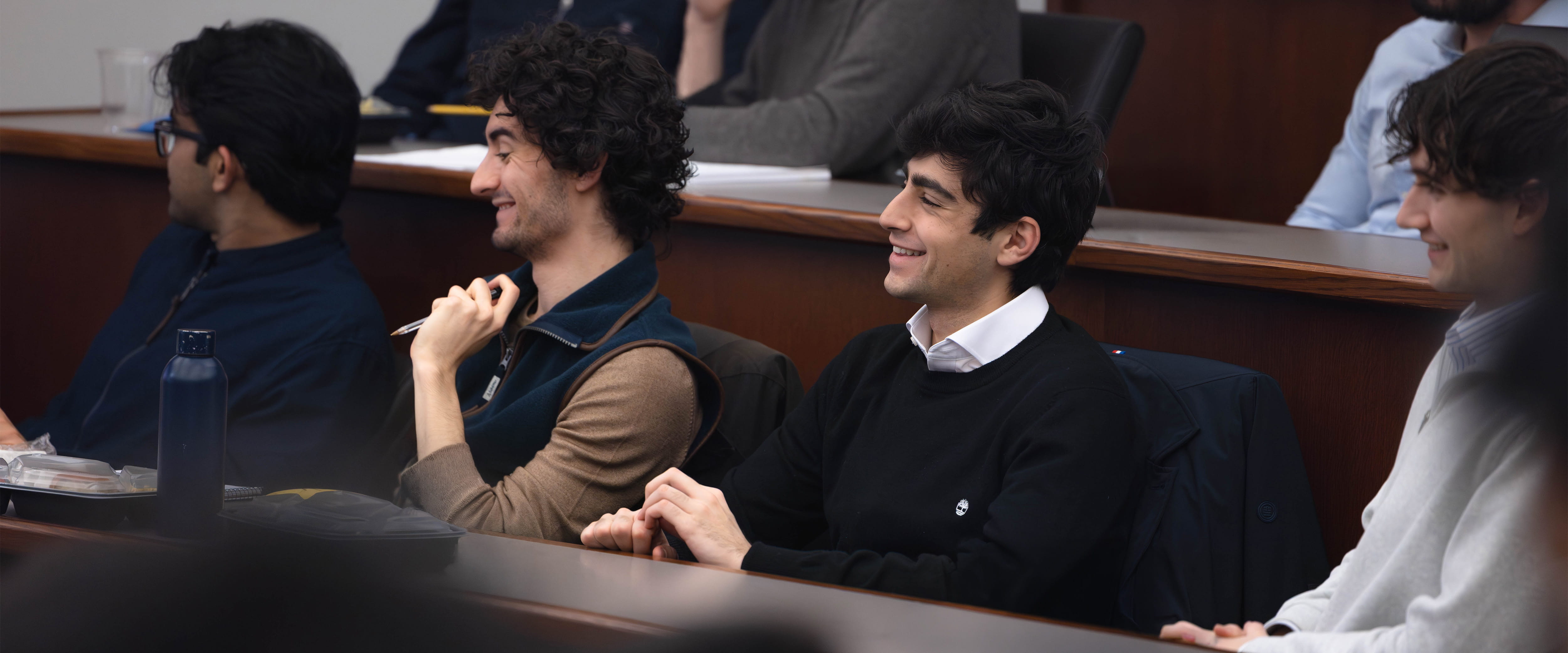 Students smiling during a class.