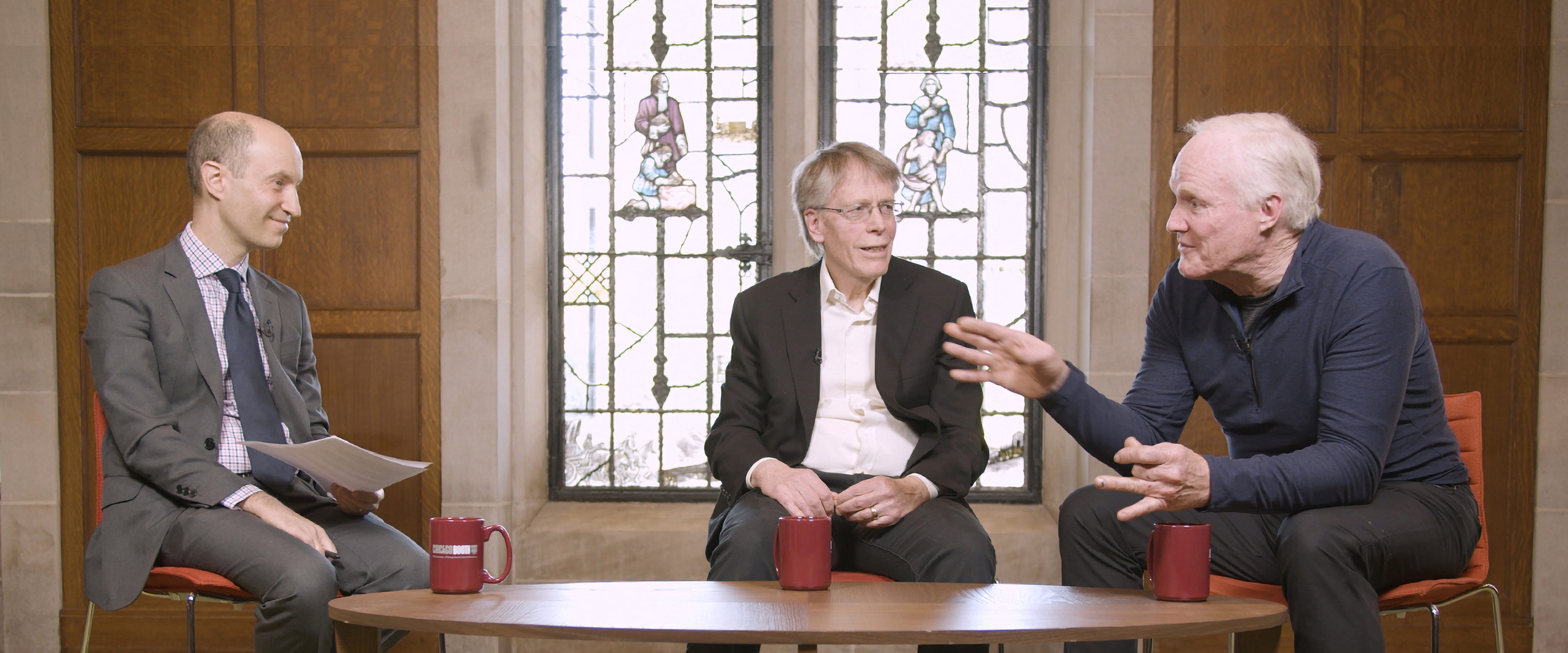 Photograph of Lars Peter Hansen and Kevin M. Murphy being interviewed