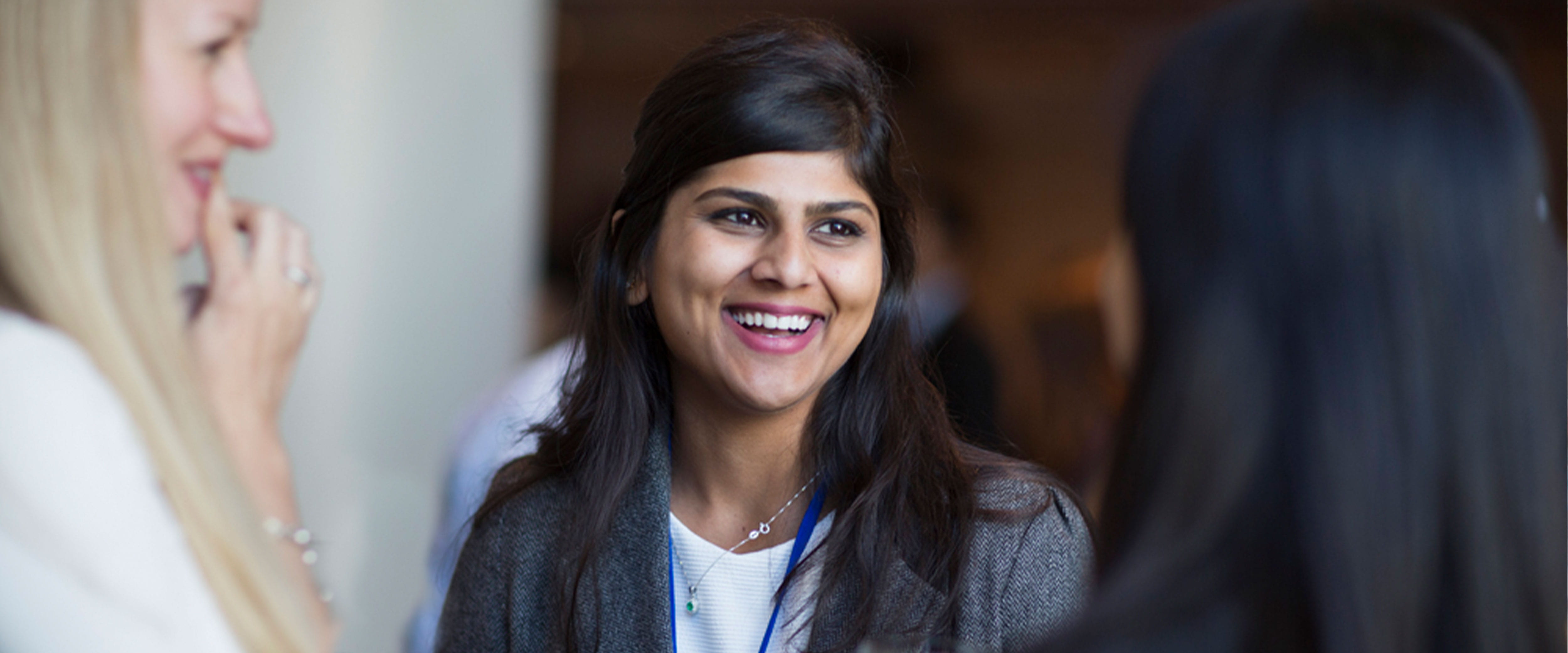 Female student smiling, social networking
