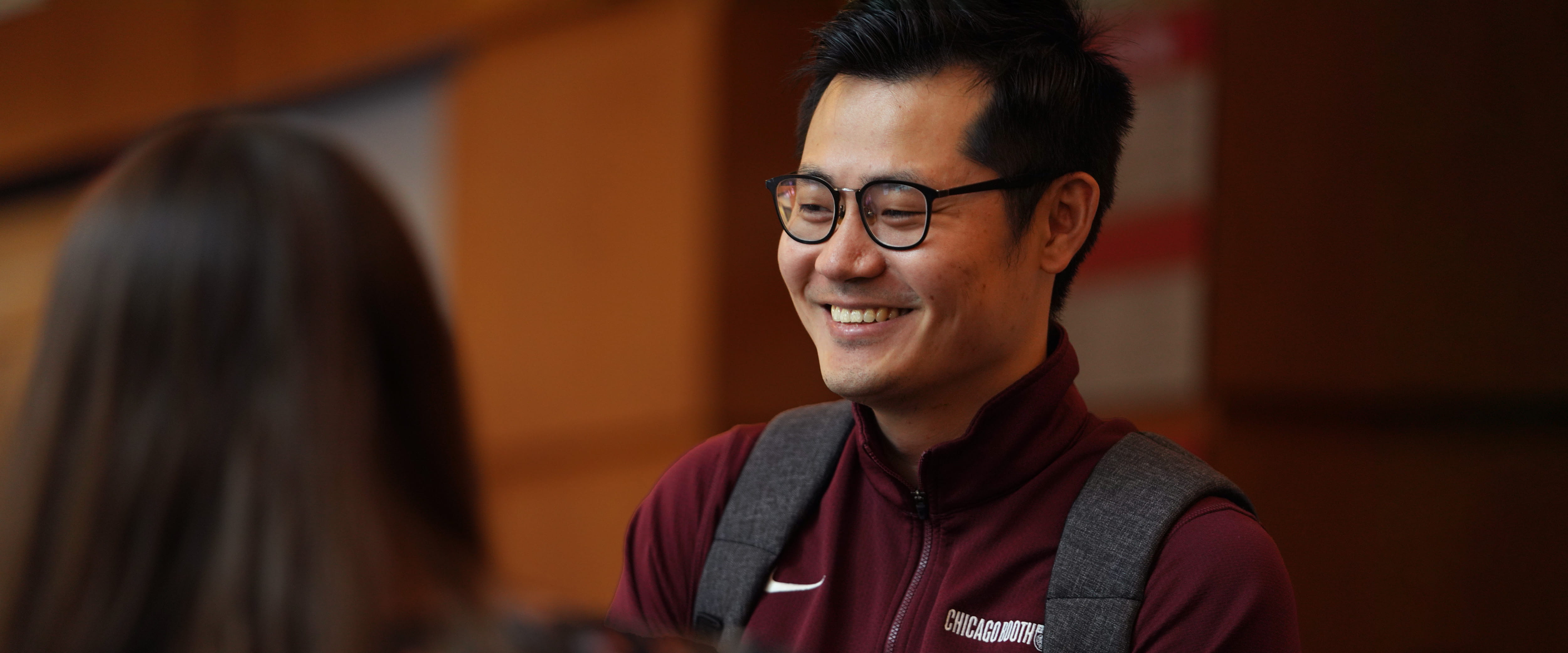 Part-time student smiling in Gleacher