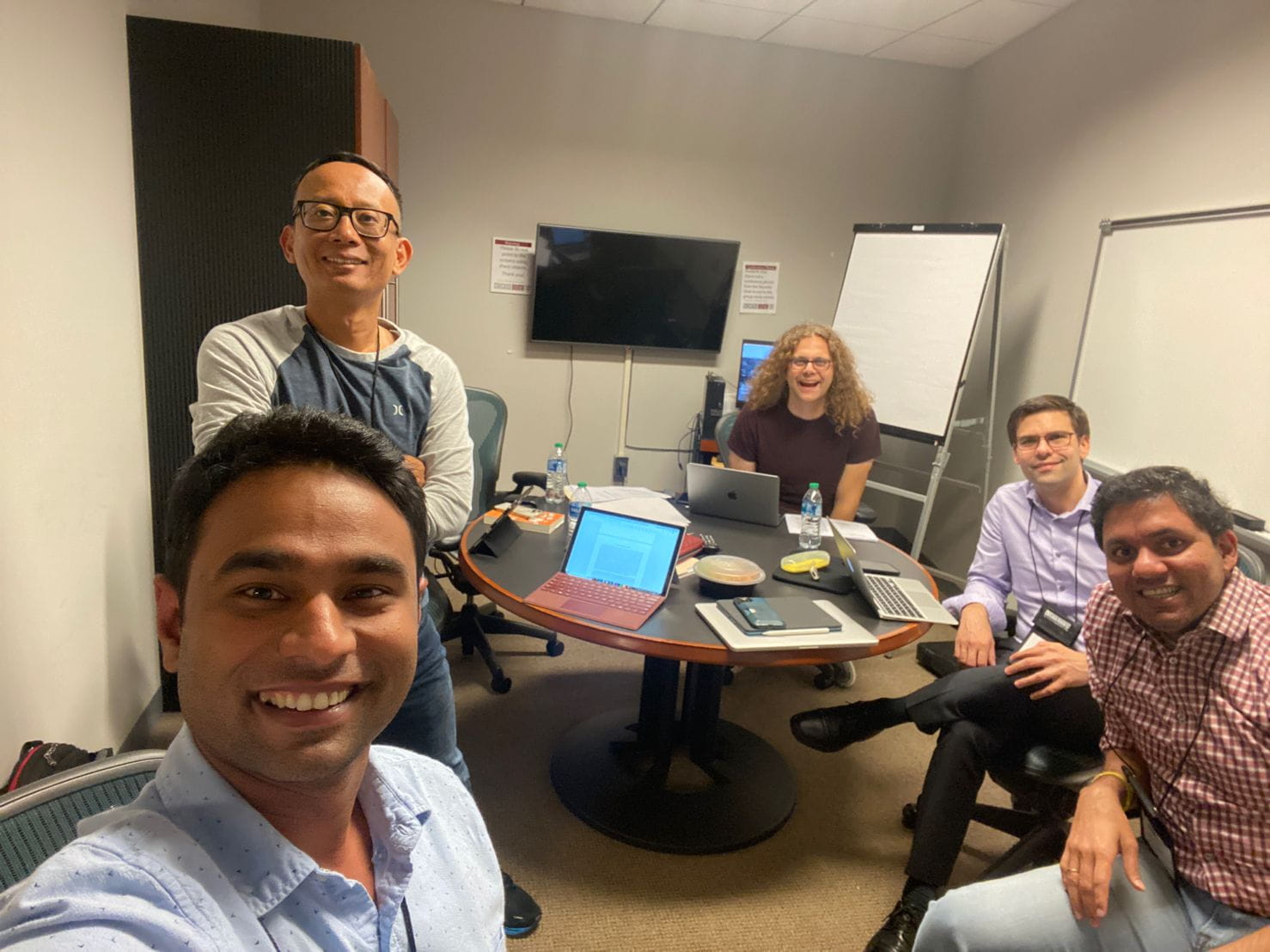 Five Chicago Booth EMBA students