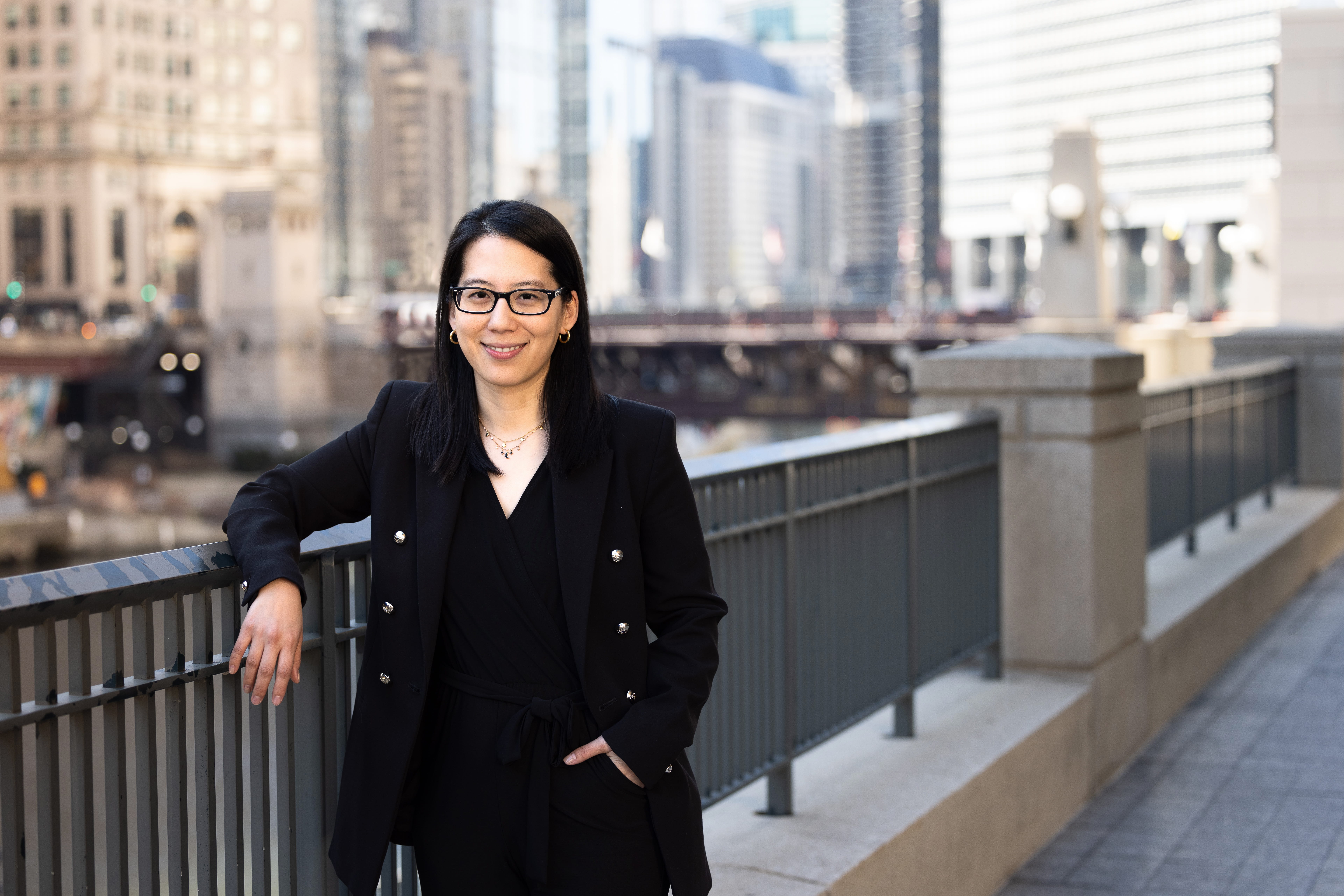 Woman standing on bridge in Chicago