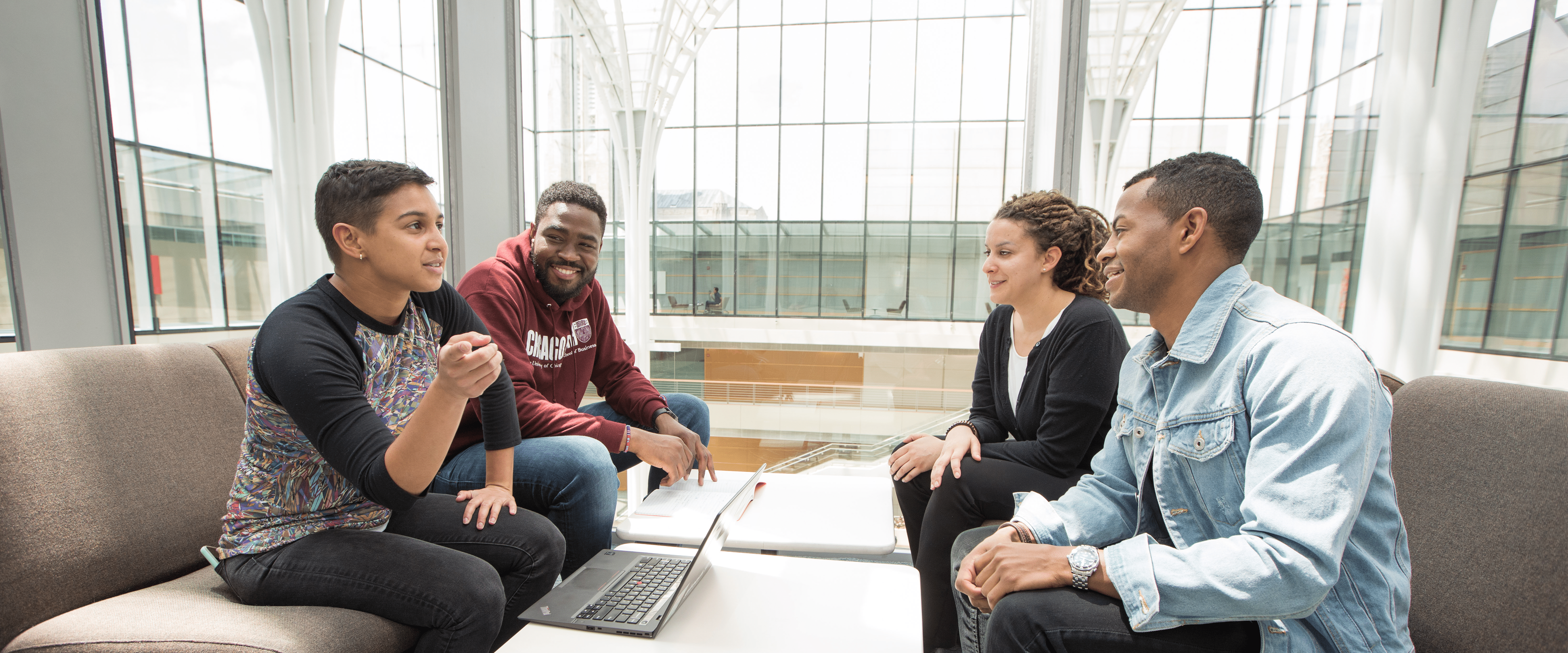 AAMBAA members talking in Harper Center