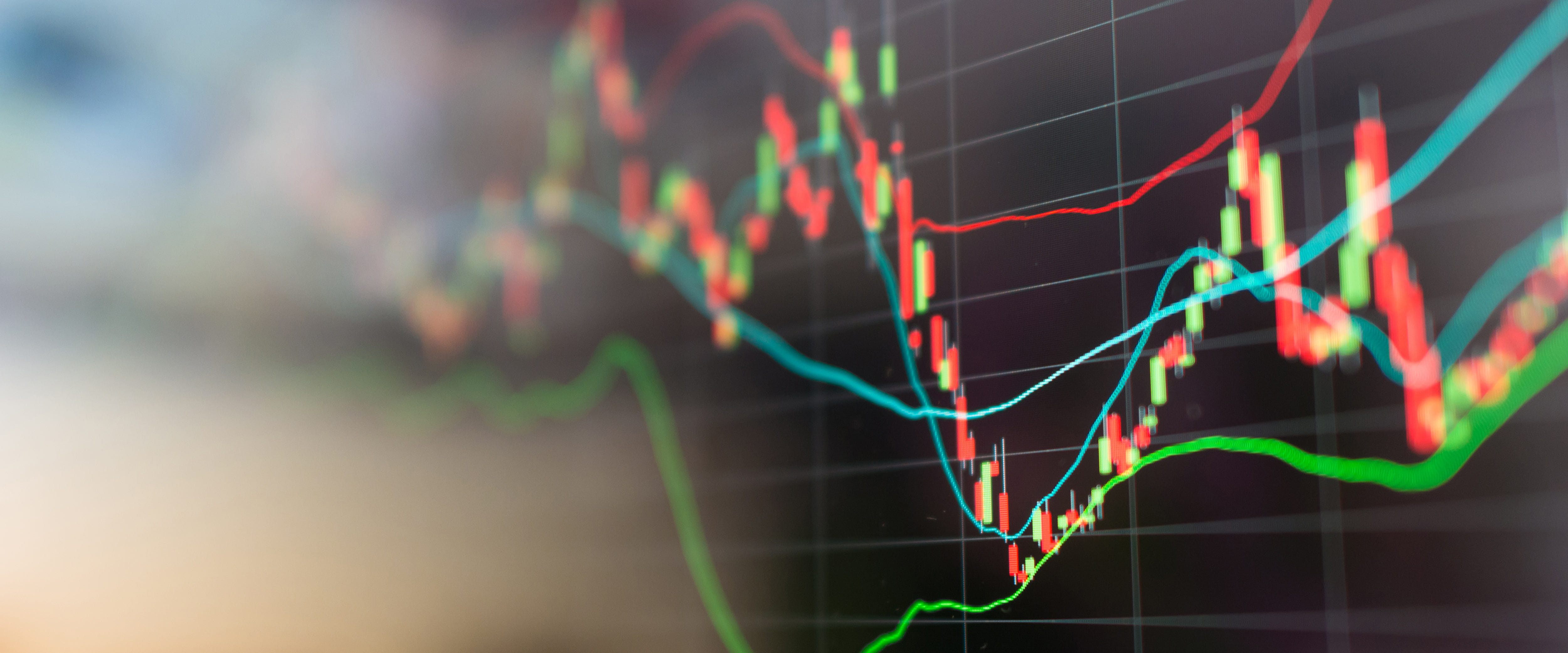 Financial charts displayed on a screen