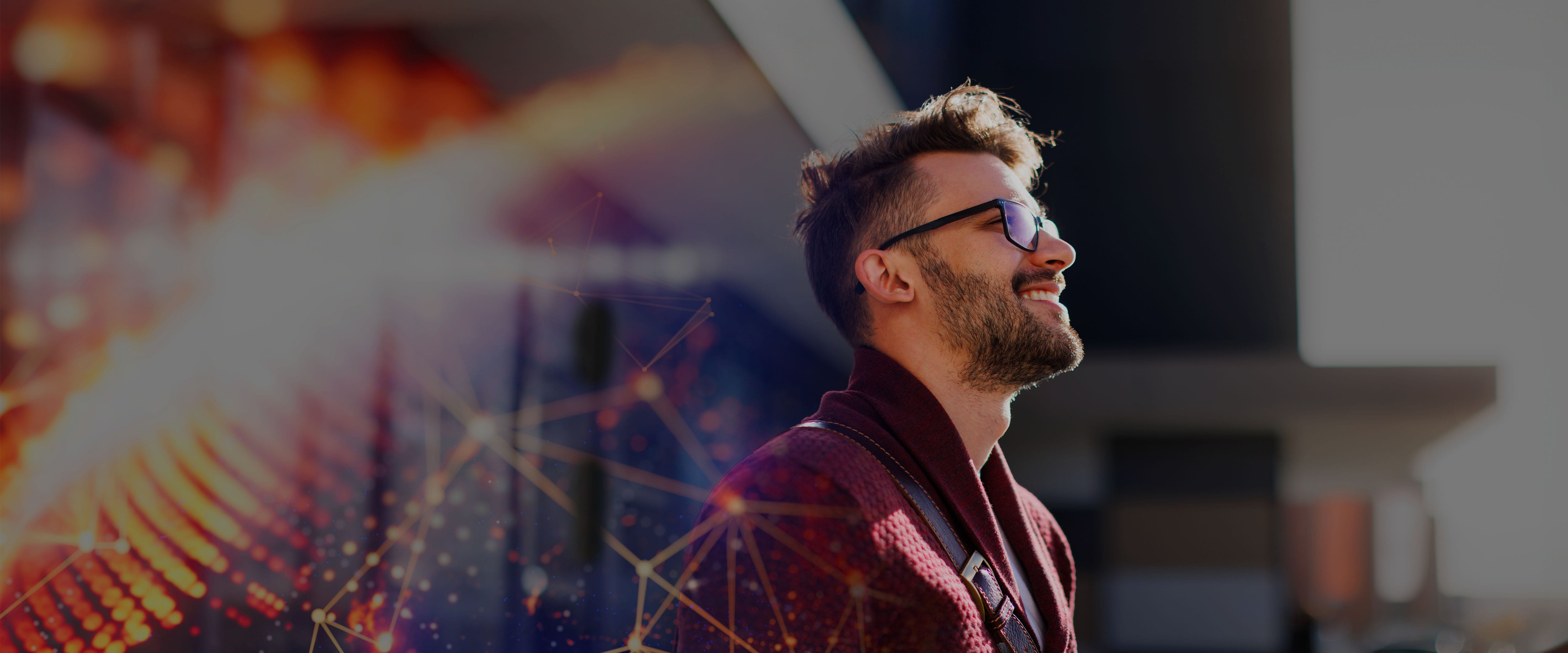 Man with glasses smiling