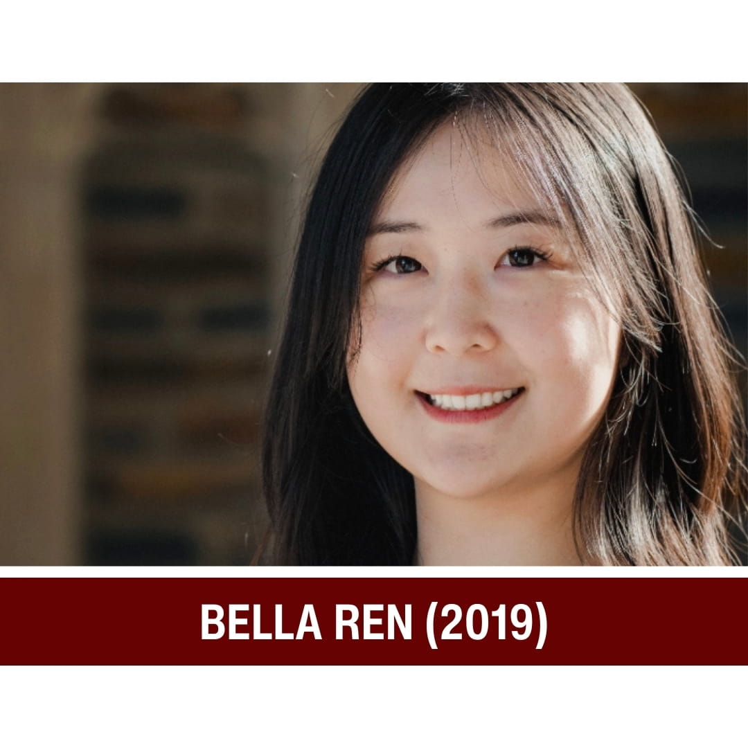 Picture of smiling dark-haired woman wearing a black shirt and standing in front of a blurred background. A red strip beneath the picture is overlaid with white text that reads: Bella Ren (2019)