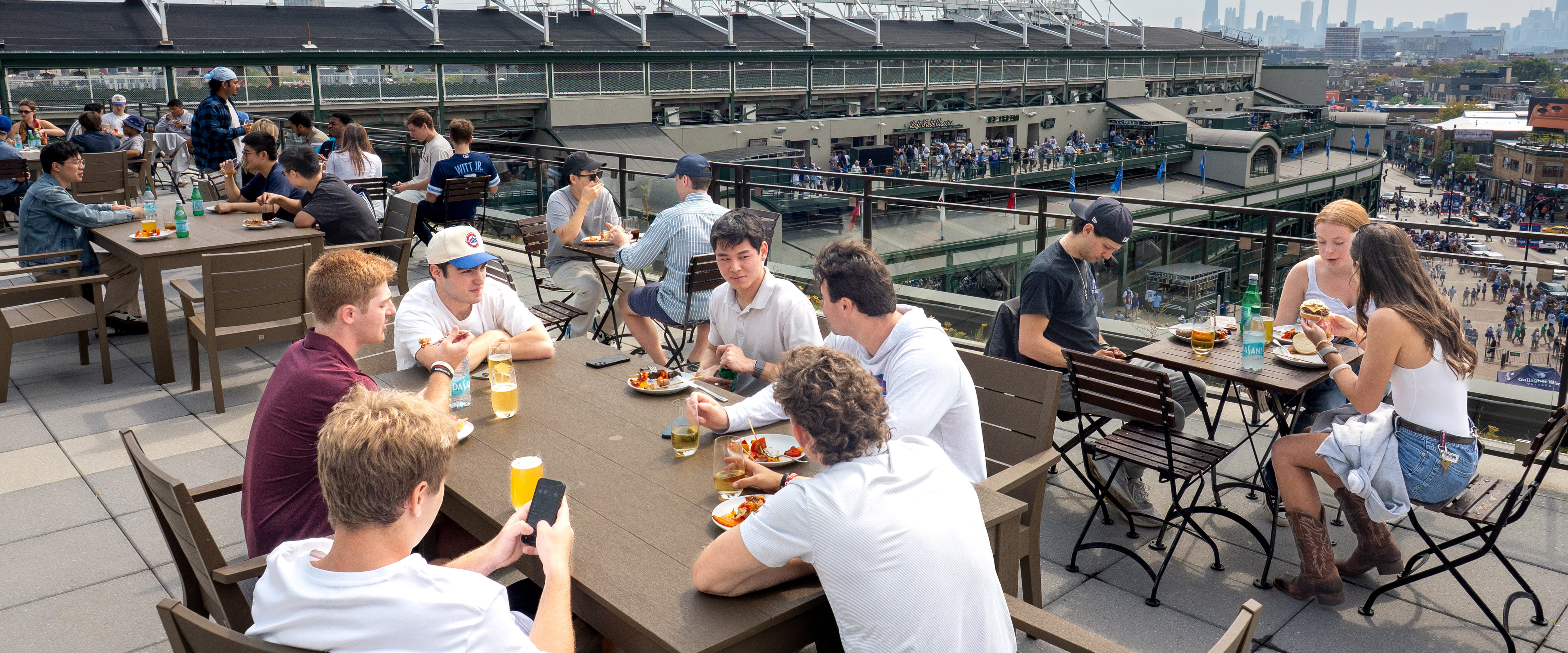 Students at the Cubs stadium hanging out.
