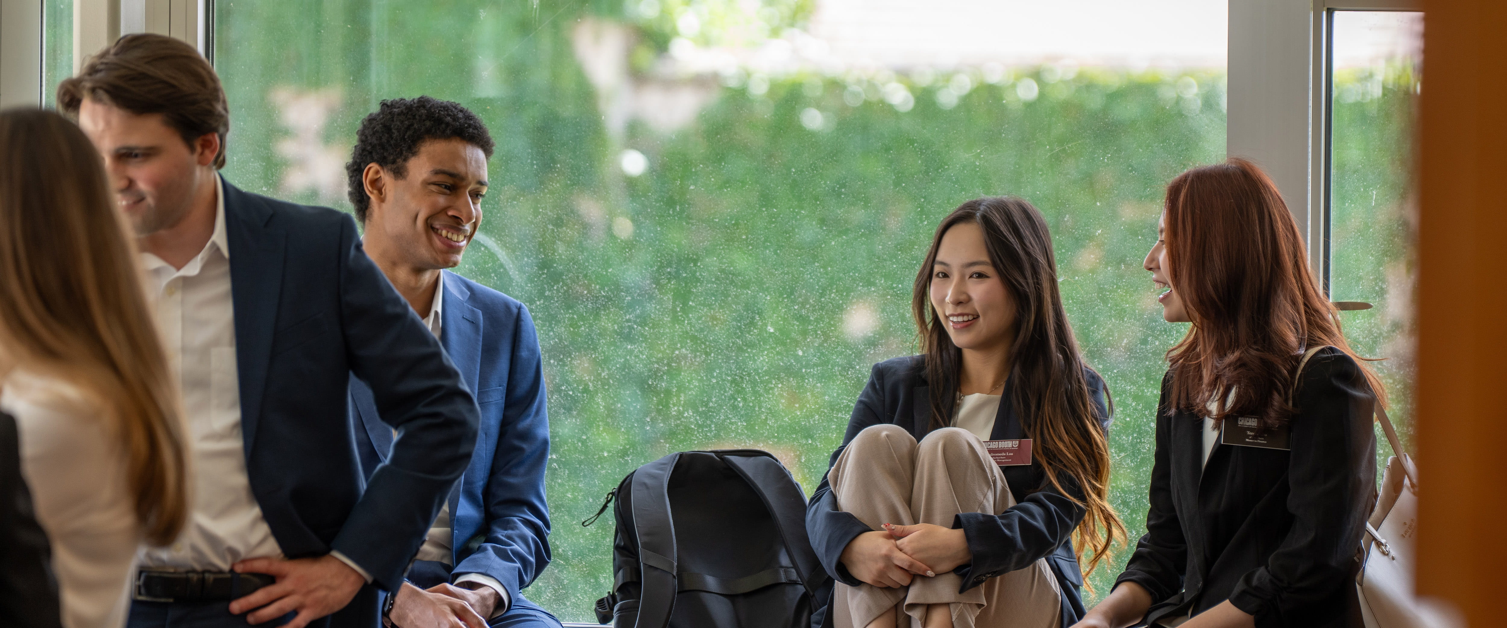 Students socializing during club event.