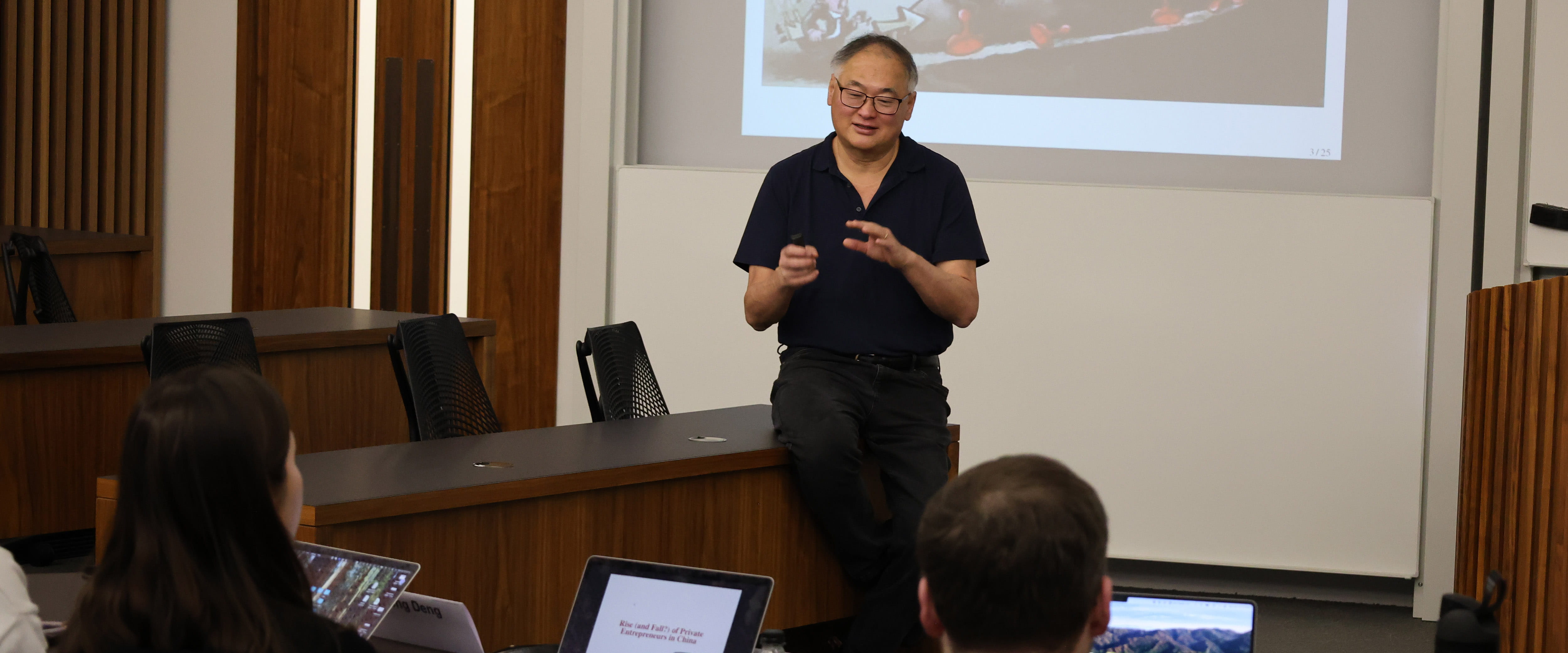 Professor Chang Tai Hsieh teaching a class.