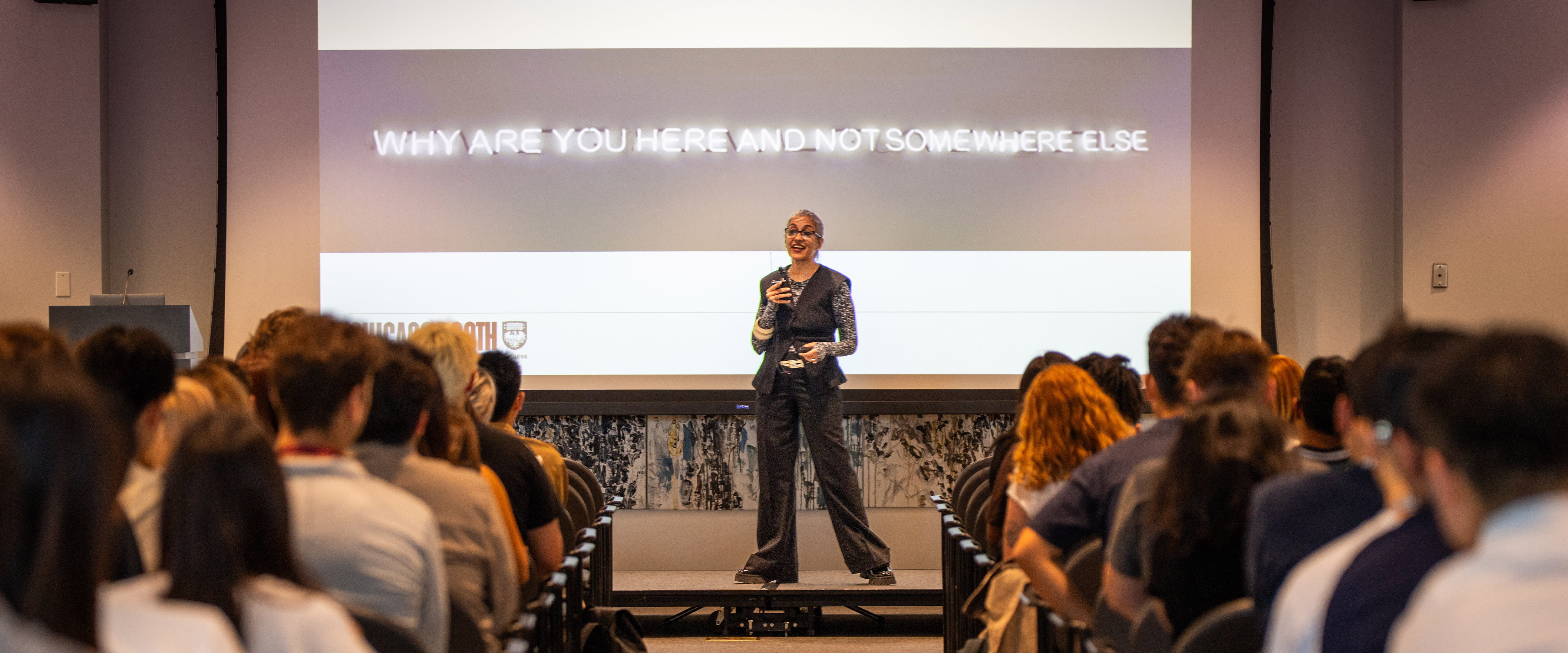 Faculty giving speech to students.