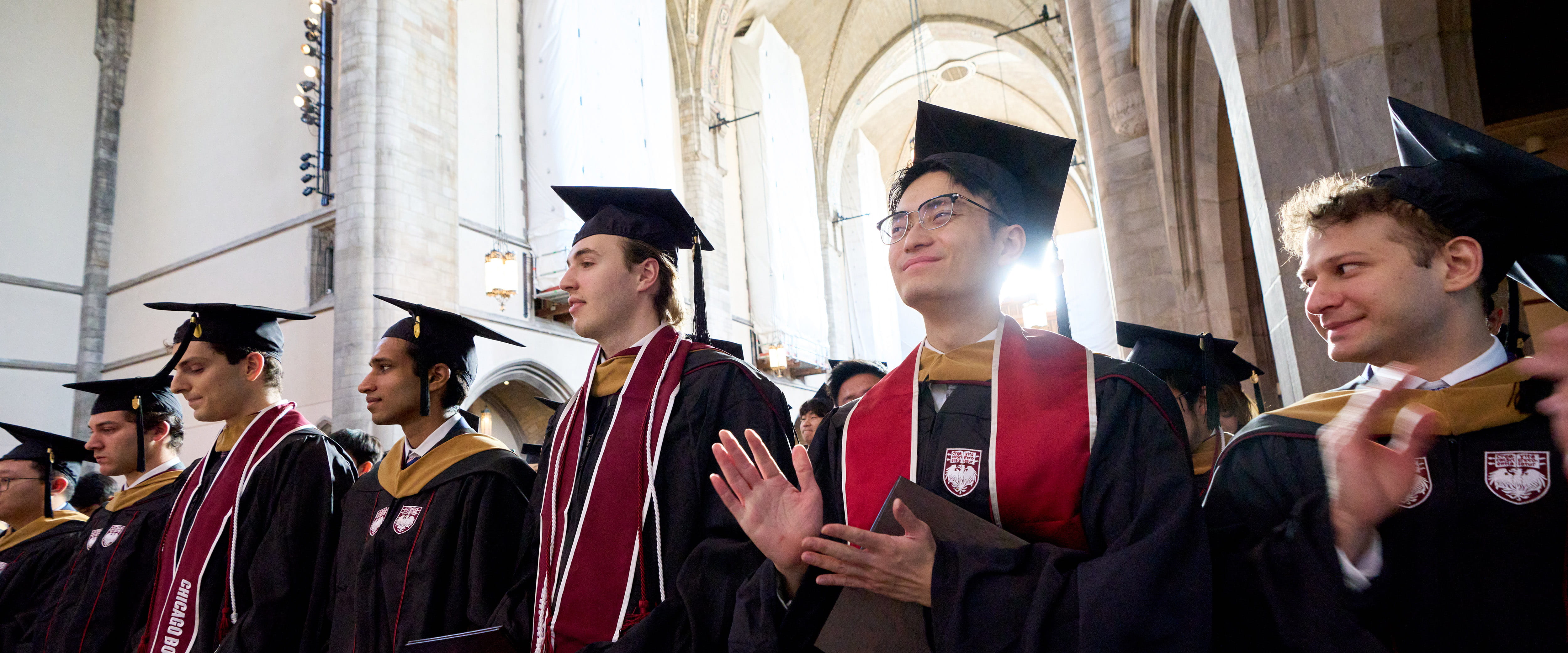 Students clapping during their graduation