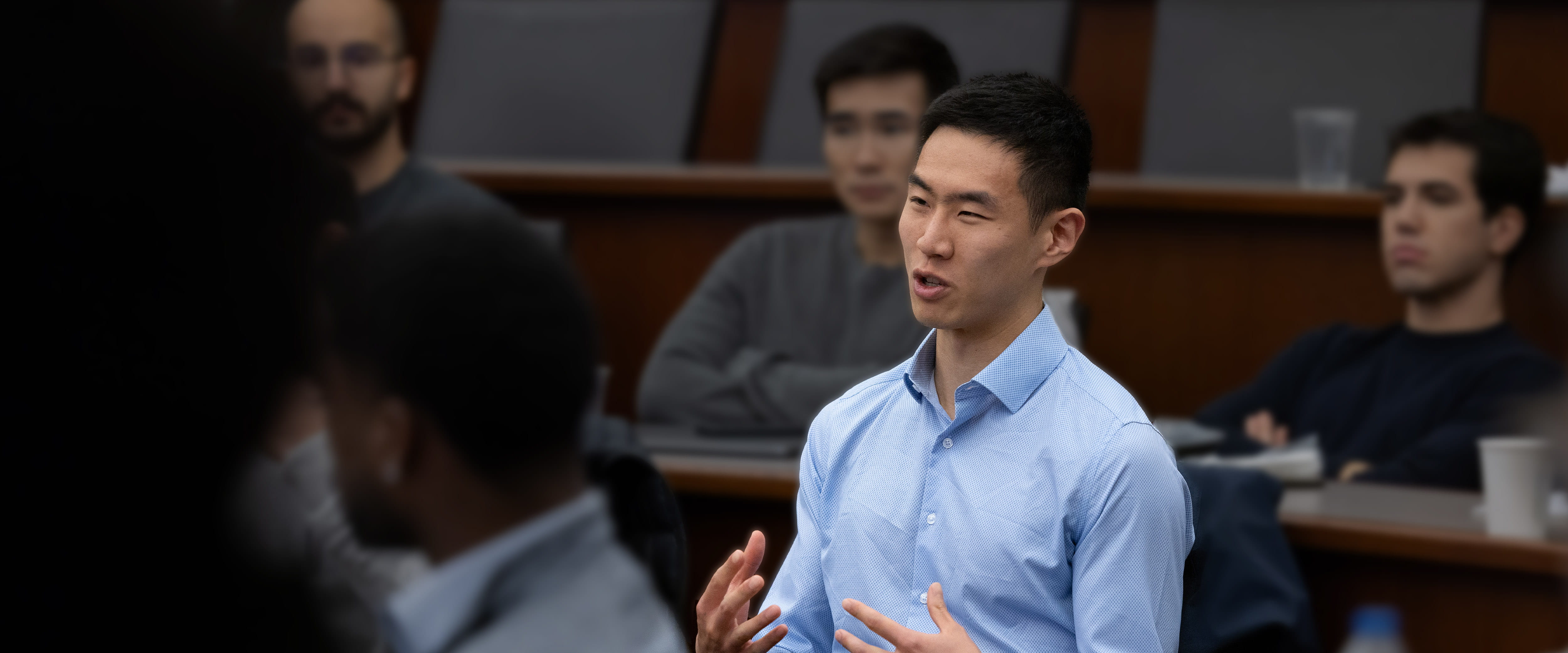 Student asking a question to professor.