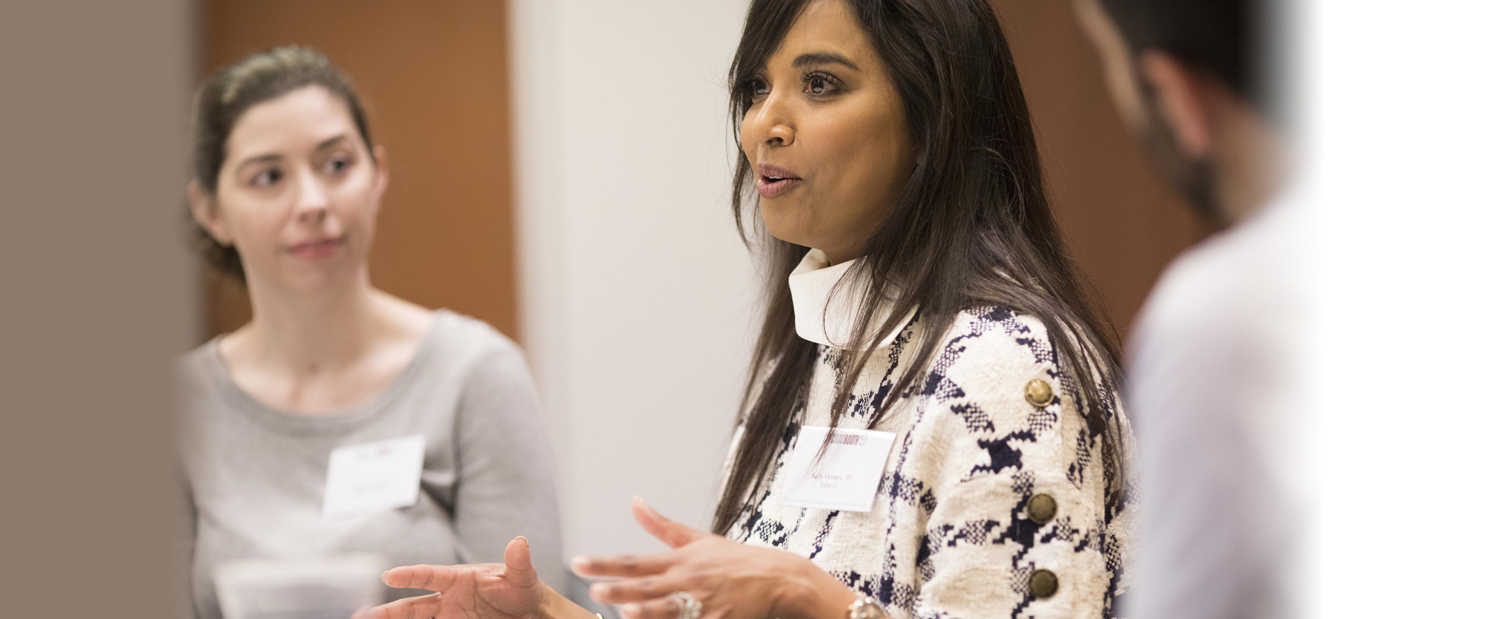 Sally Grimes talks with students at a Kilts Center event