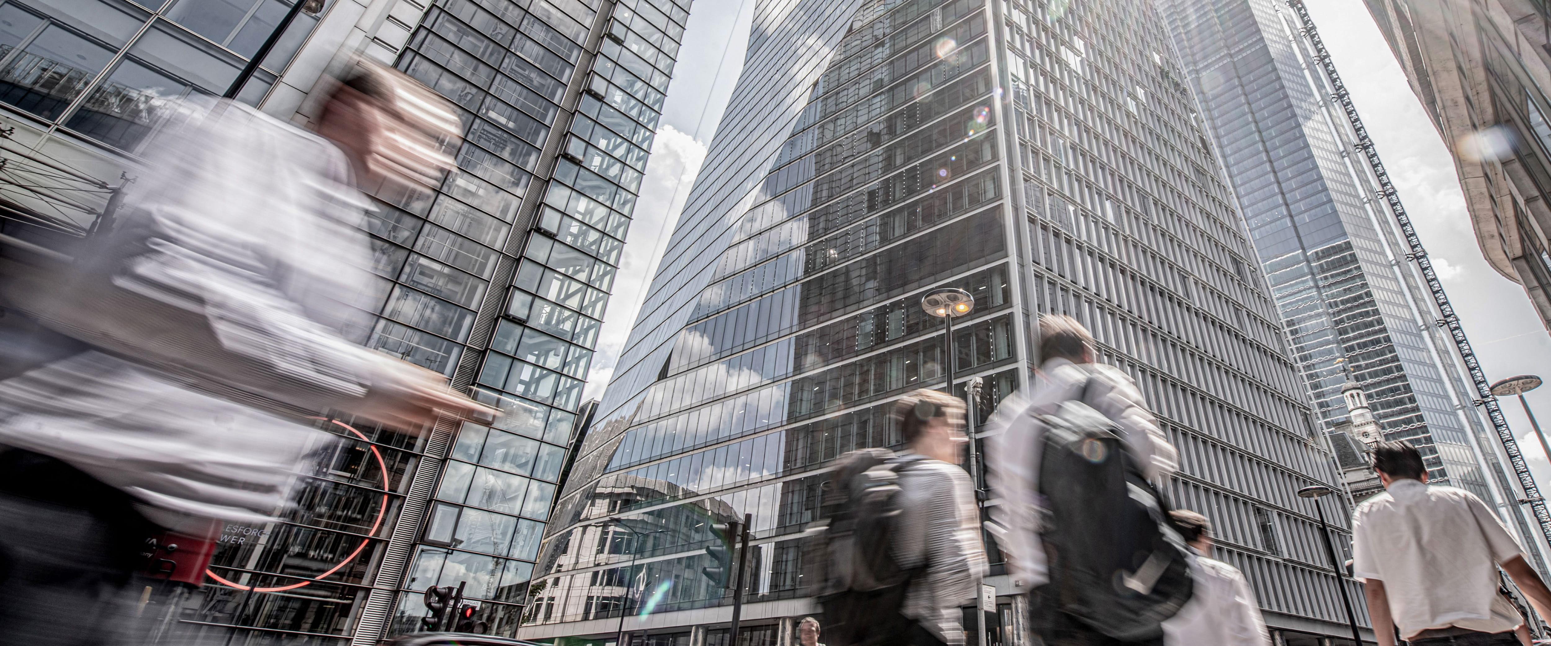Motion blur of people walking to work in London financial district