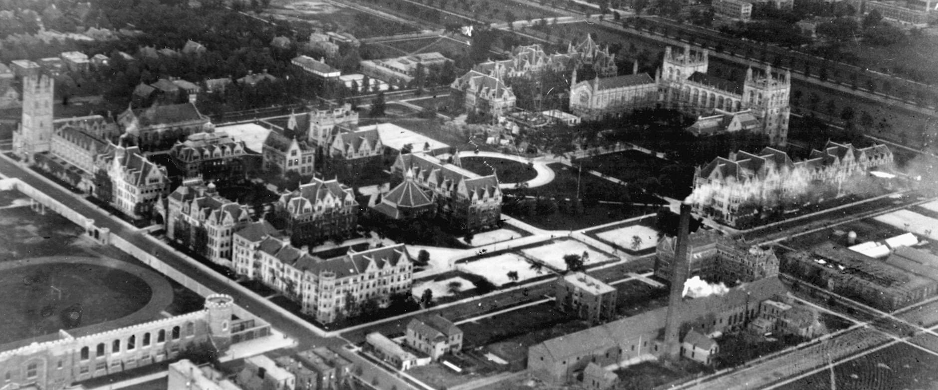Black and white historic photo of campus from above
