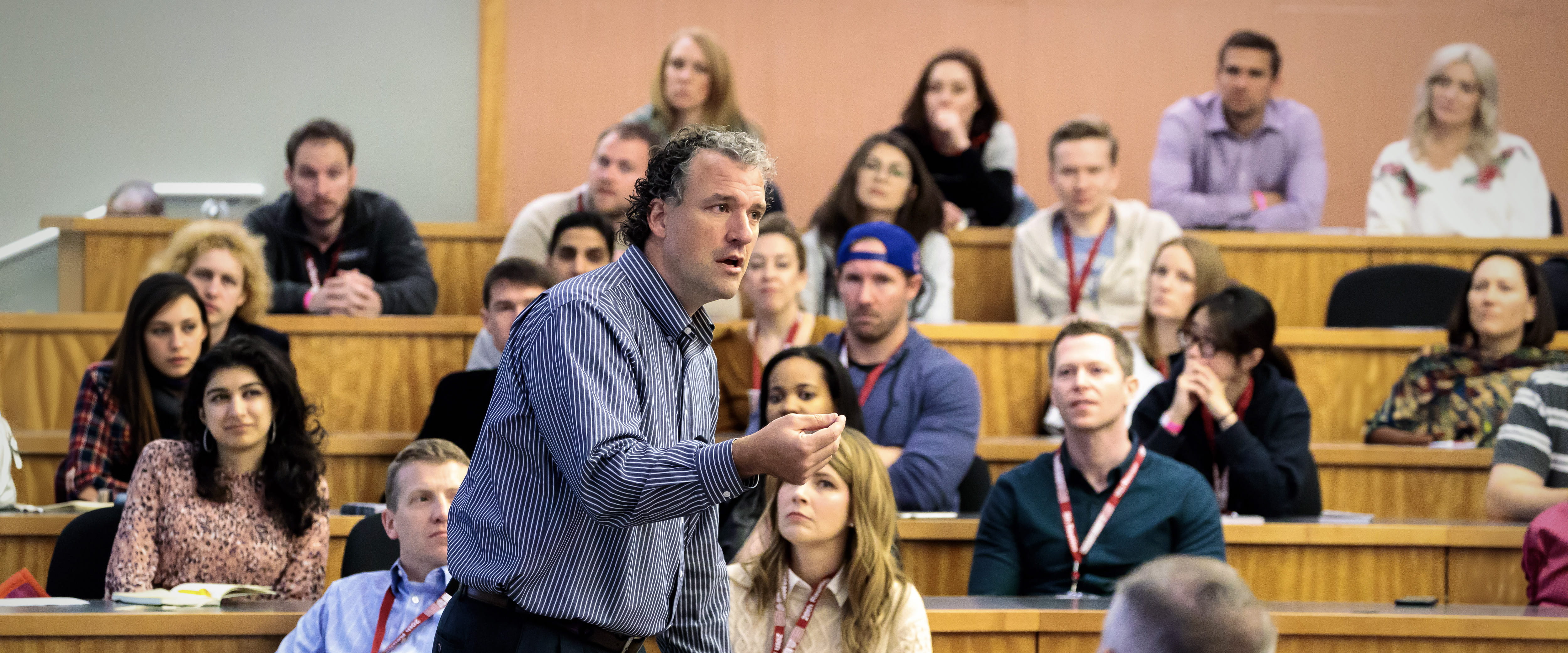 Students gathered in the Chicago Booth winter garden for the first day of class