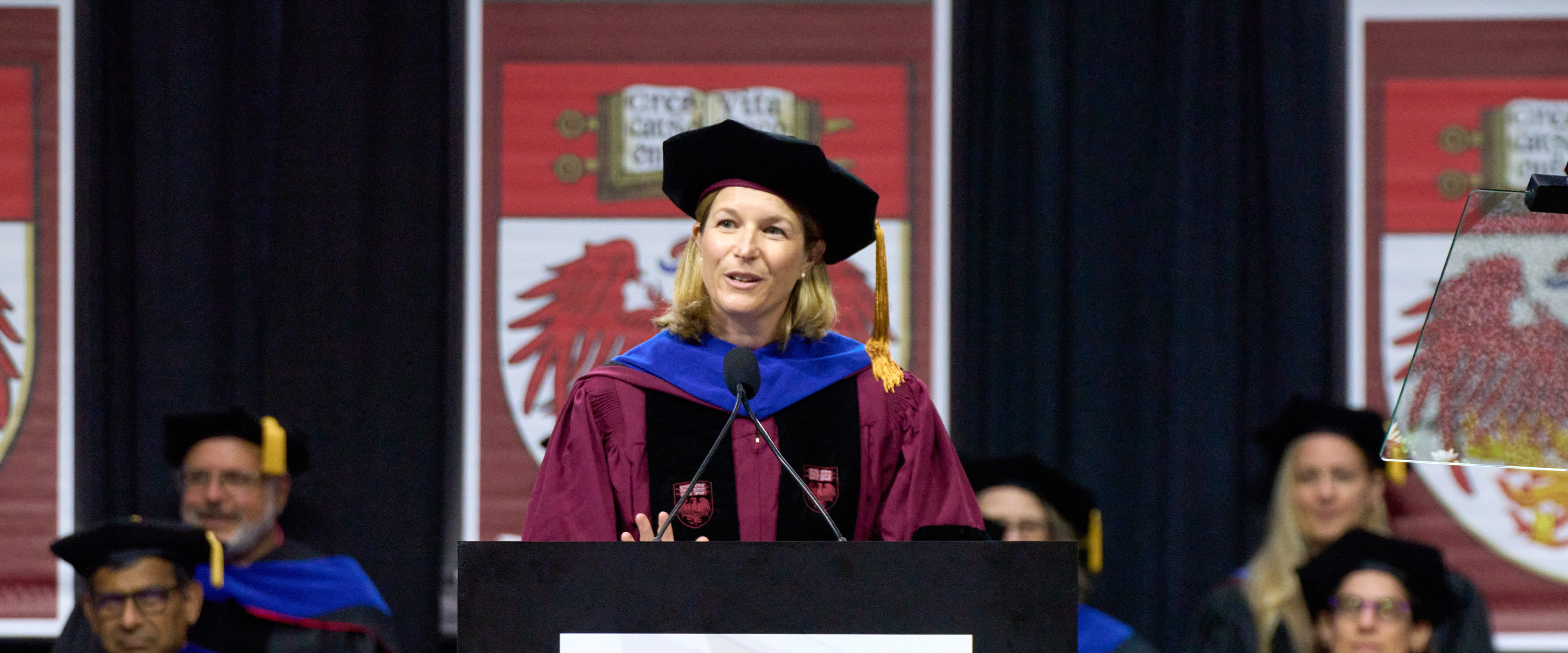 Sarah London giving the commencement speech at the Chicago Booth graduation