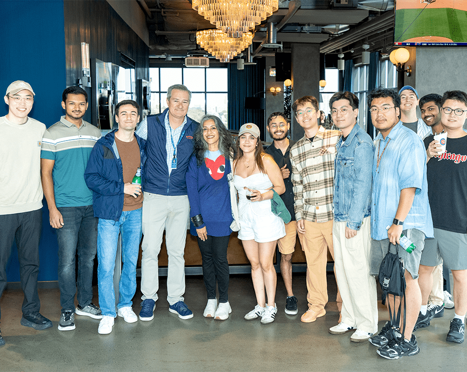 A group of Booth students at a Cubs game.