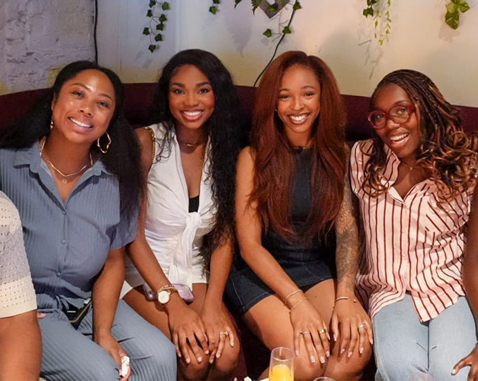 Four students posing for a picture.