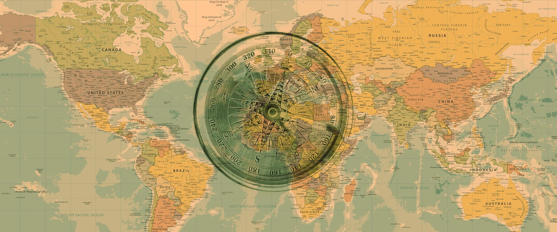 Map of the world with a compass at the center