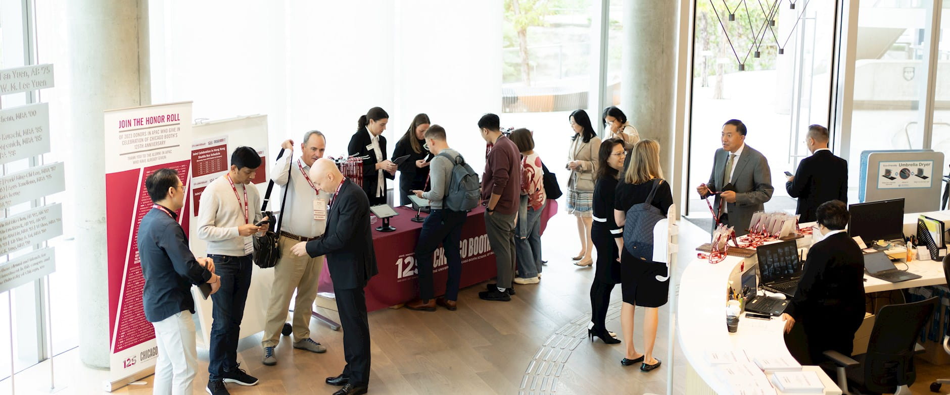 Chicago Booth students engaging with the UChicago Booth at an event