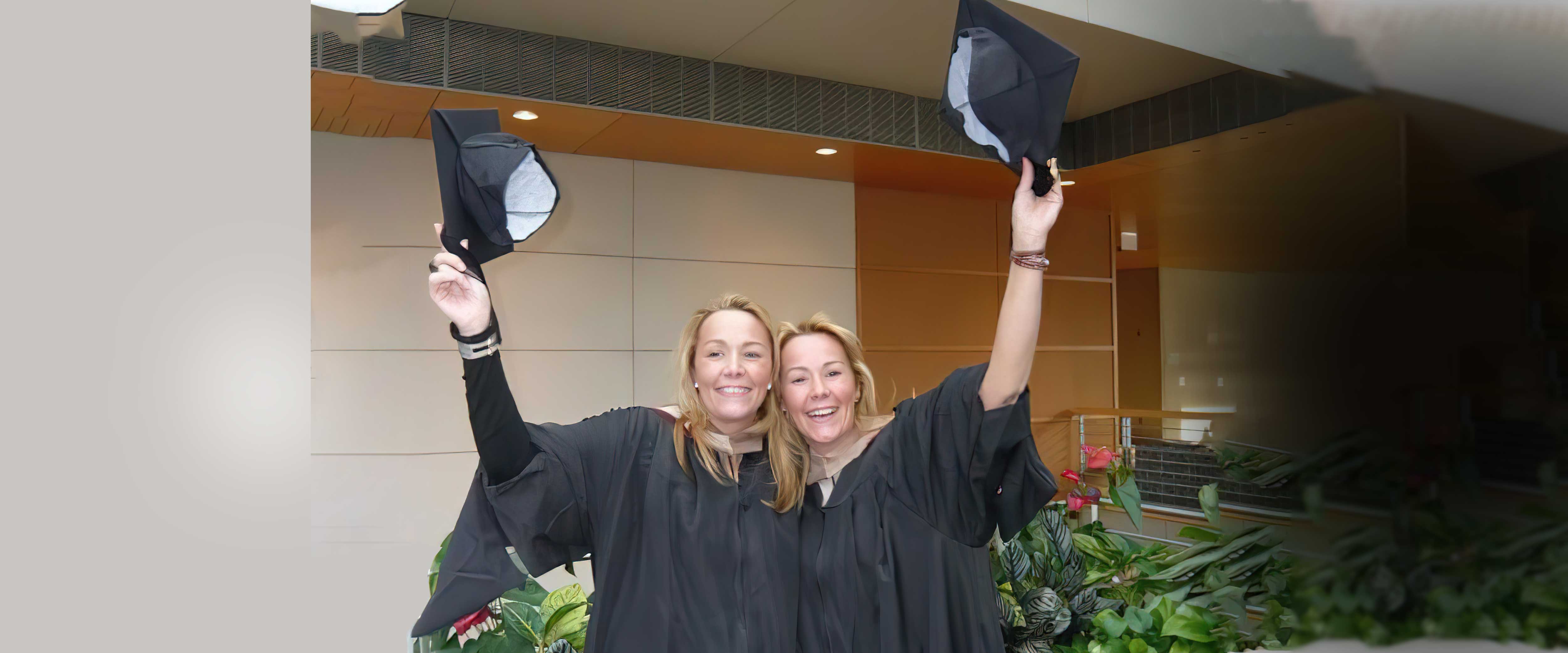 Lydie Roux and Laurence Roux in the Harper Center winter garden