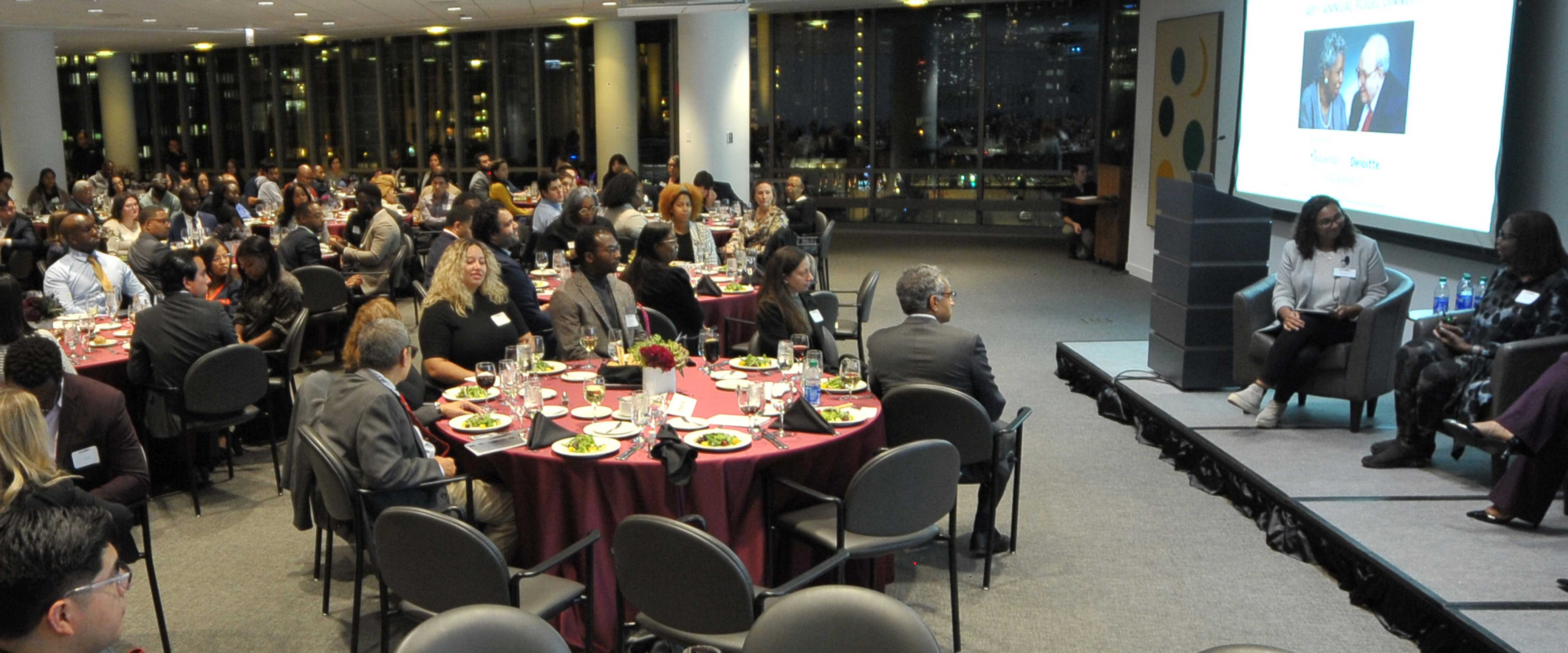Fogel dinner participants listening to the panel