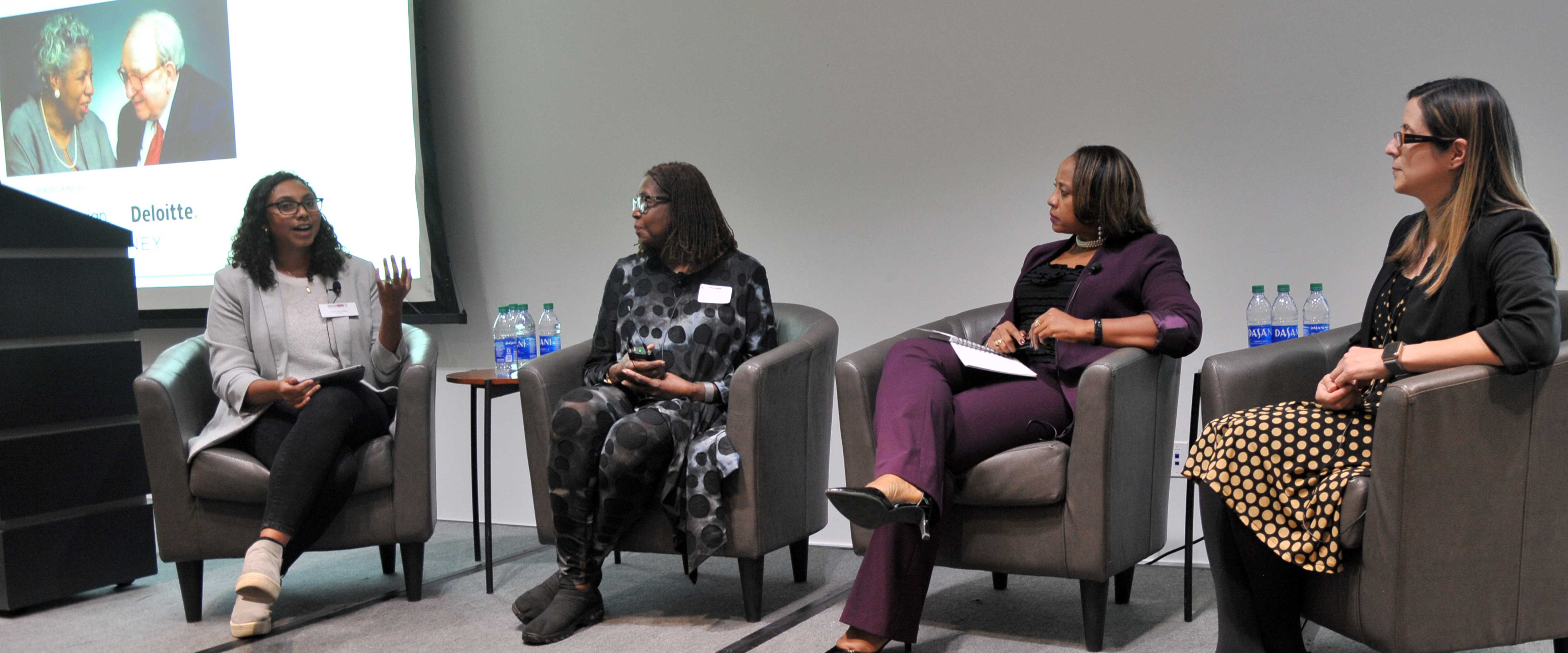 Panel of women speaking at the Fogel dinner
