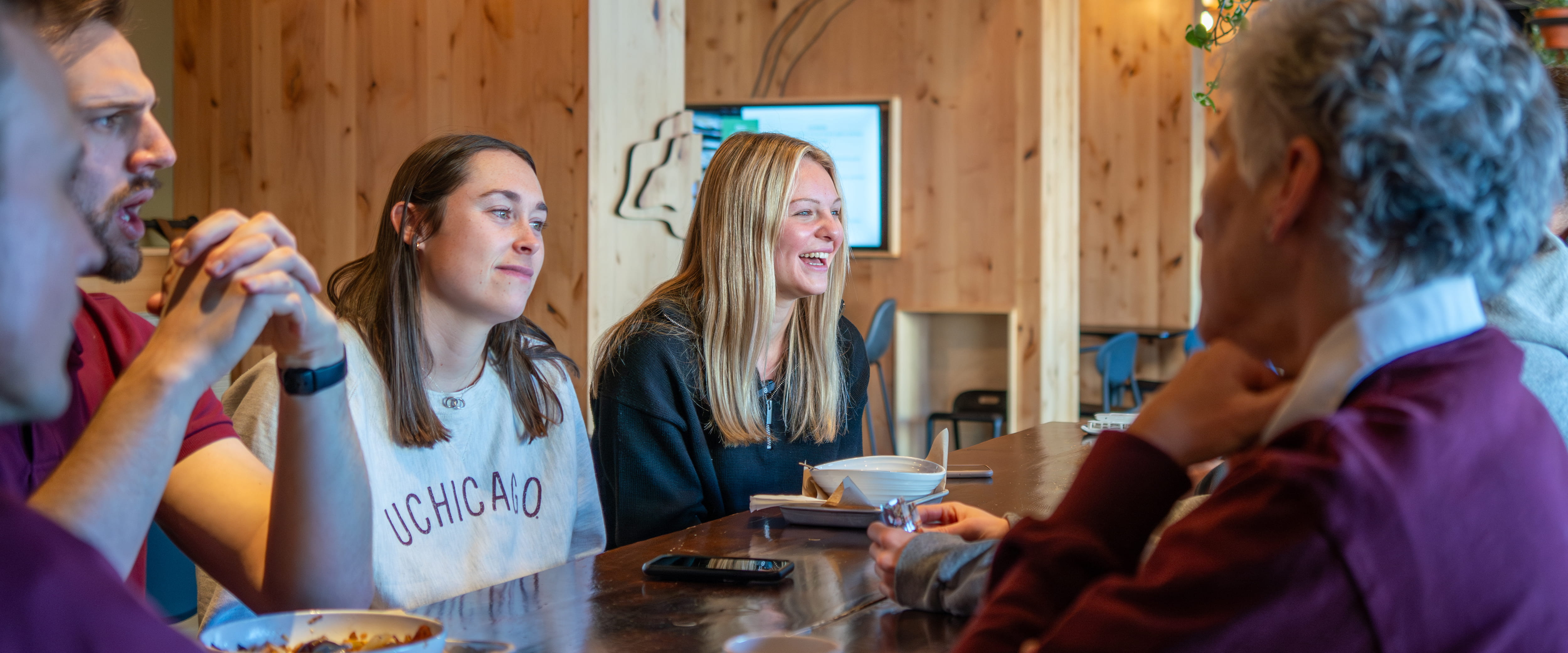 Keeley Shaye Kandziora talking to Booth admissions representatives