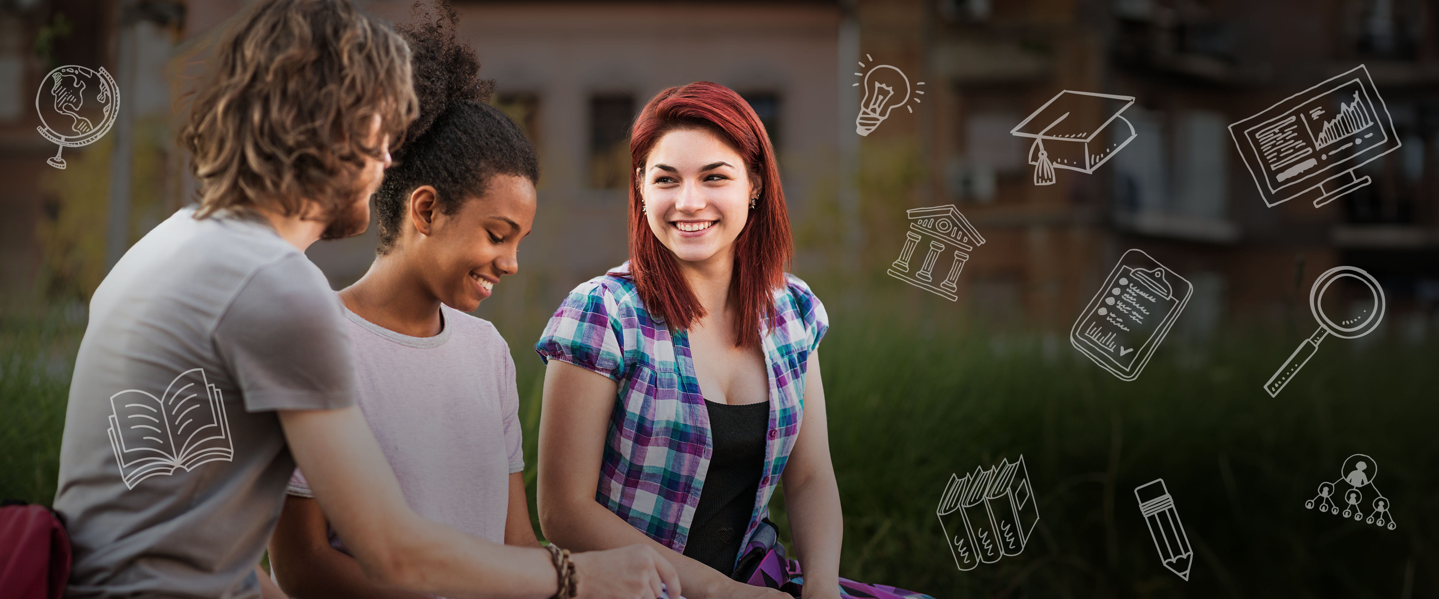 Three students working together on a bench