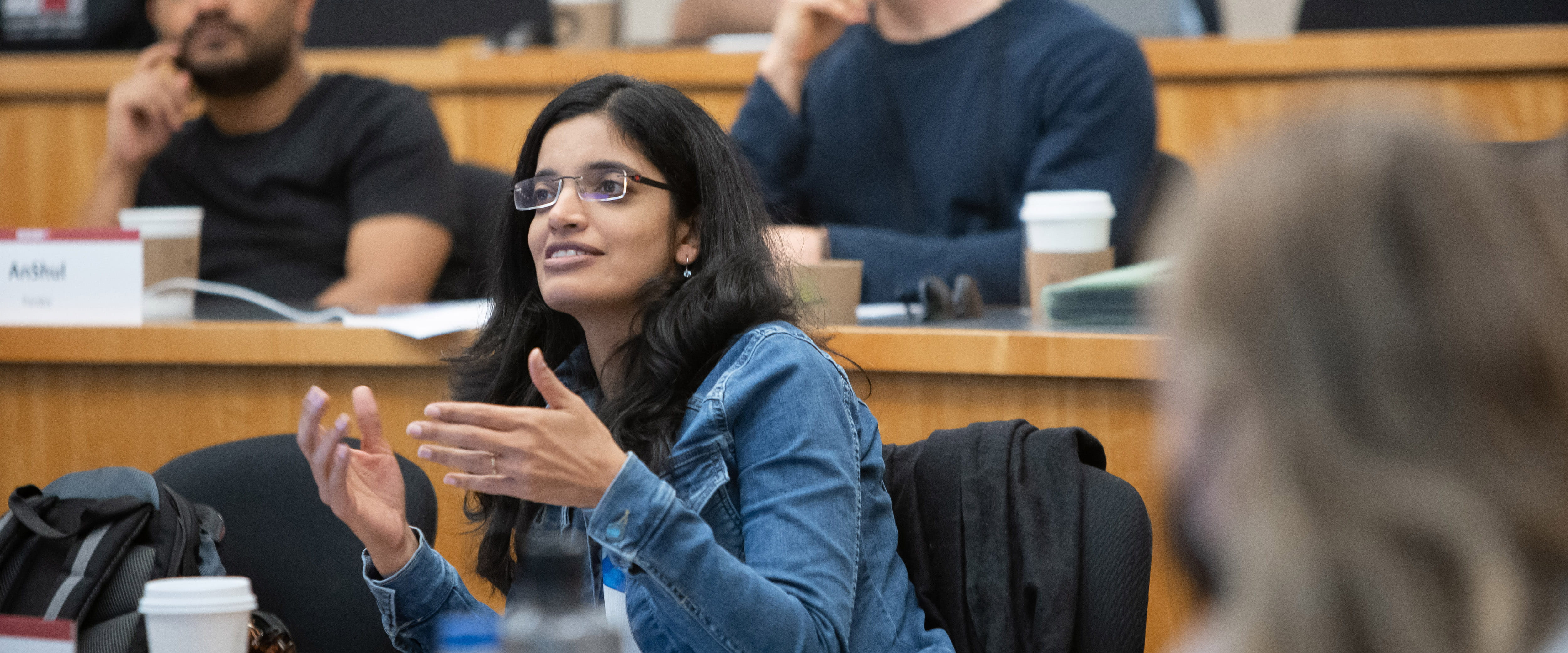 EMBA student asking question in class