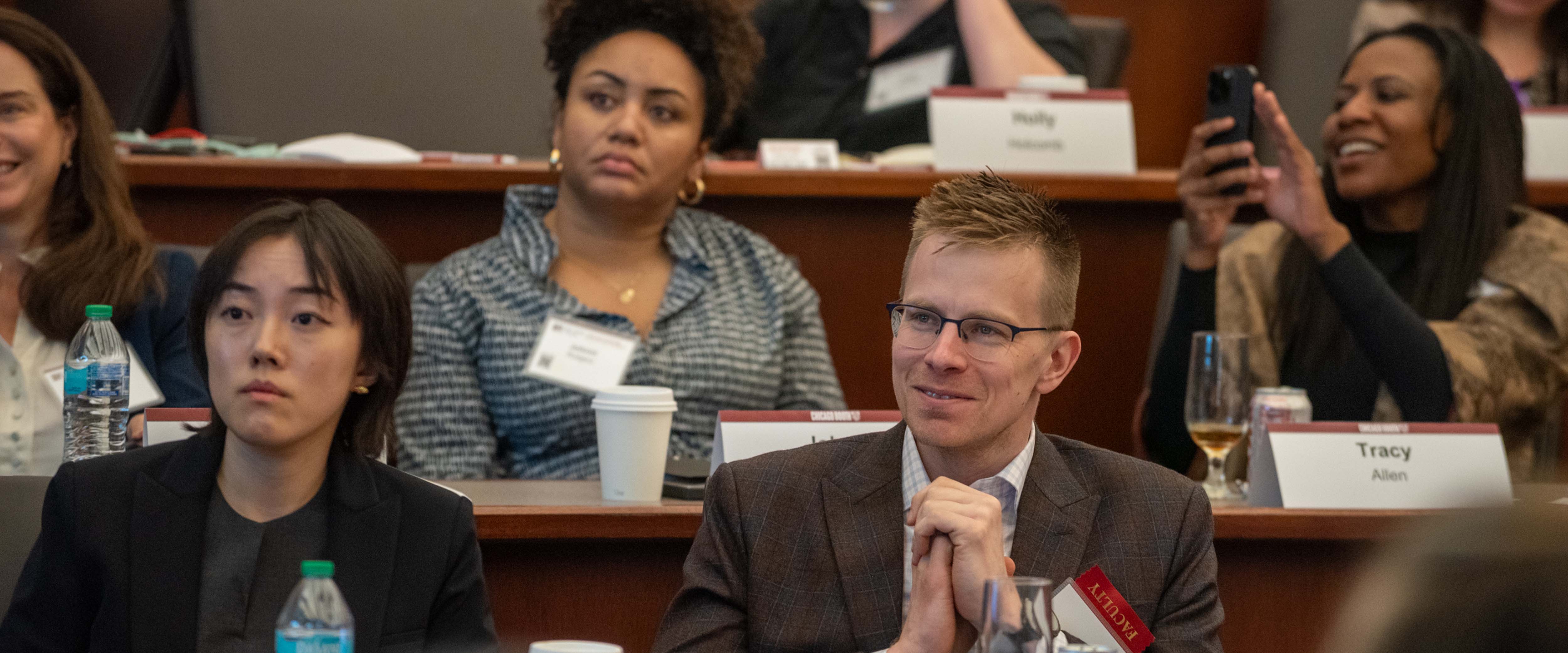 summit members watching presentation