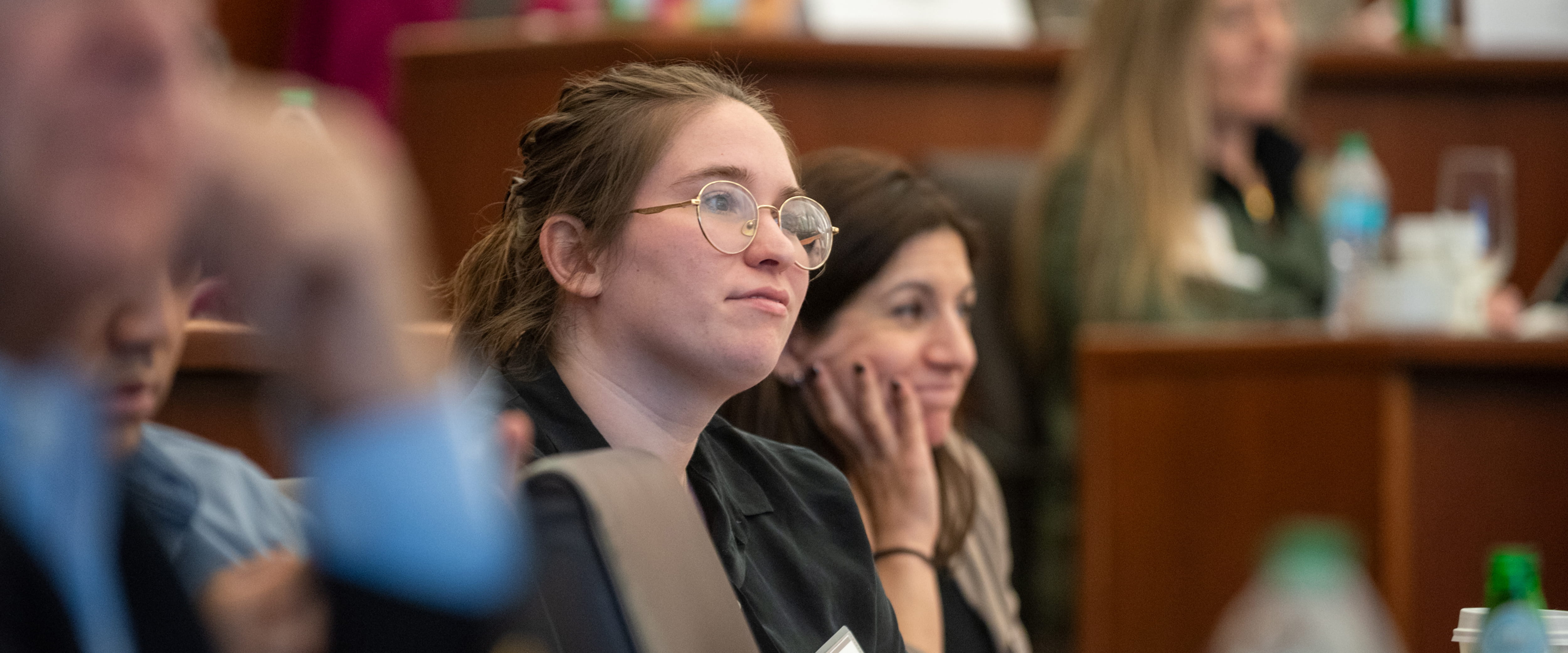 Women listening in business classroom