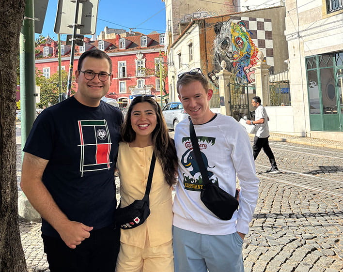 Christos Papandreou and friends smiling outside 