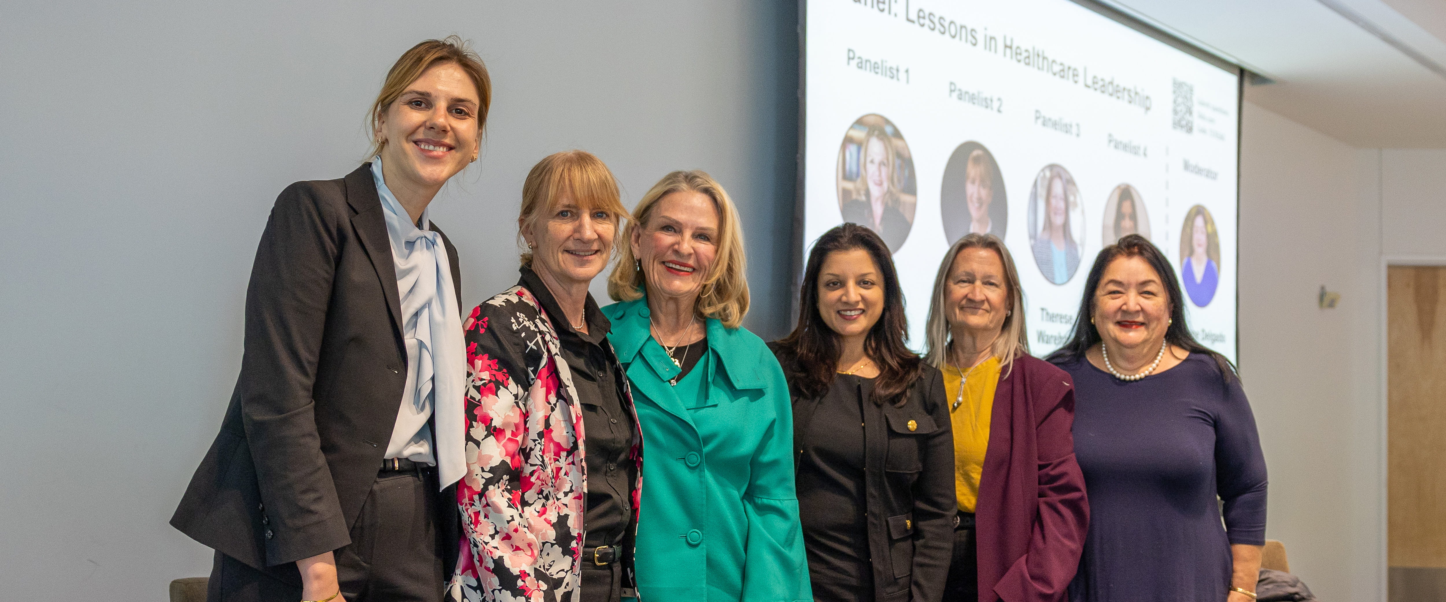 Group of women posing together happily 